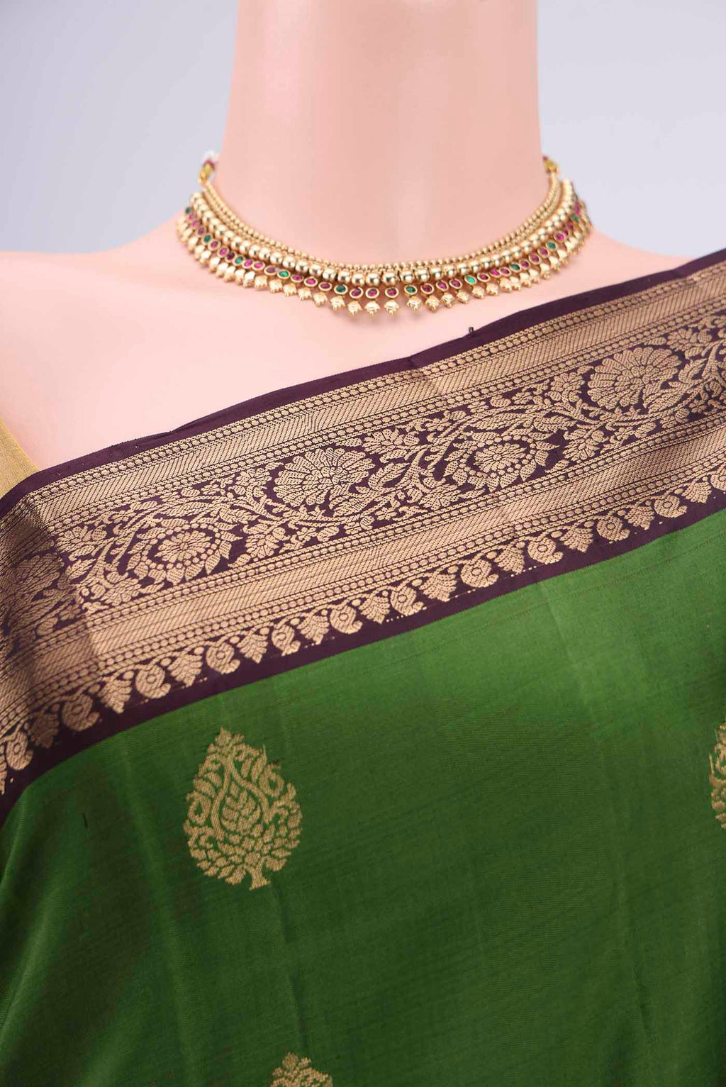 Border image of Green Soft Silk Saree with Zari Butta on the body and Zari Border. 