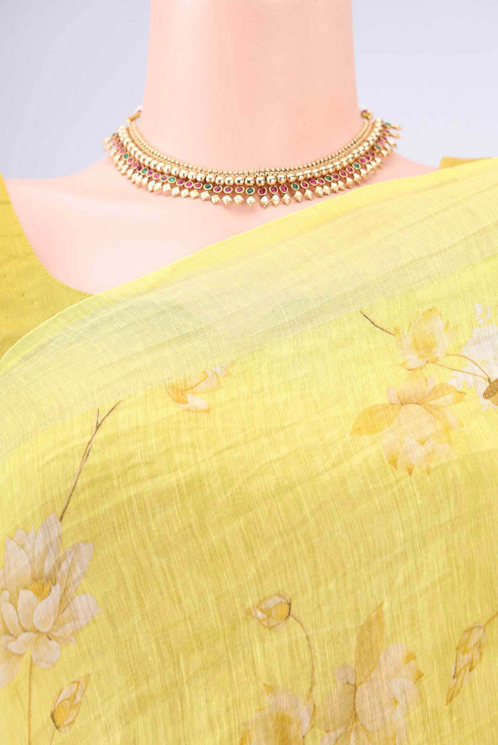 Border image of Lemon Yellow Linen Saree with Animal Print on the body and Zari Border. 