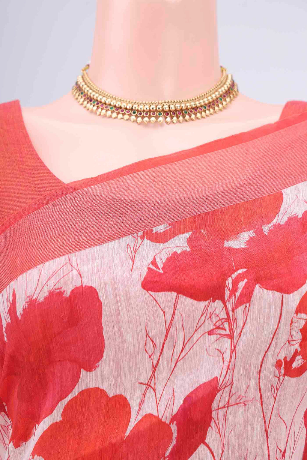 Border image of Off White Linen Saree with Floral Print on the body and Zari Border. 