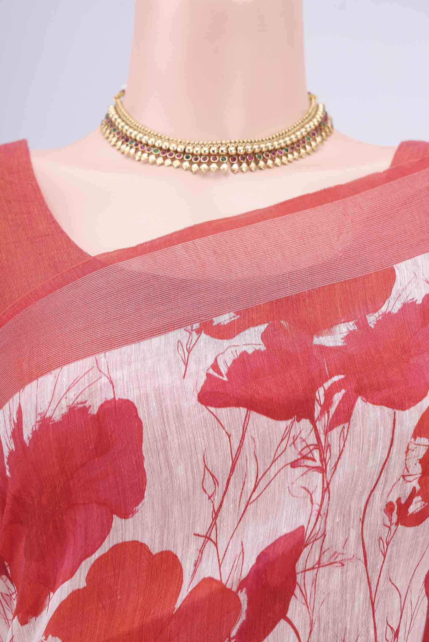 Border image of Off White Linen Saree with Floral Print on the body and Zari Border. 