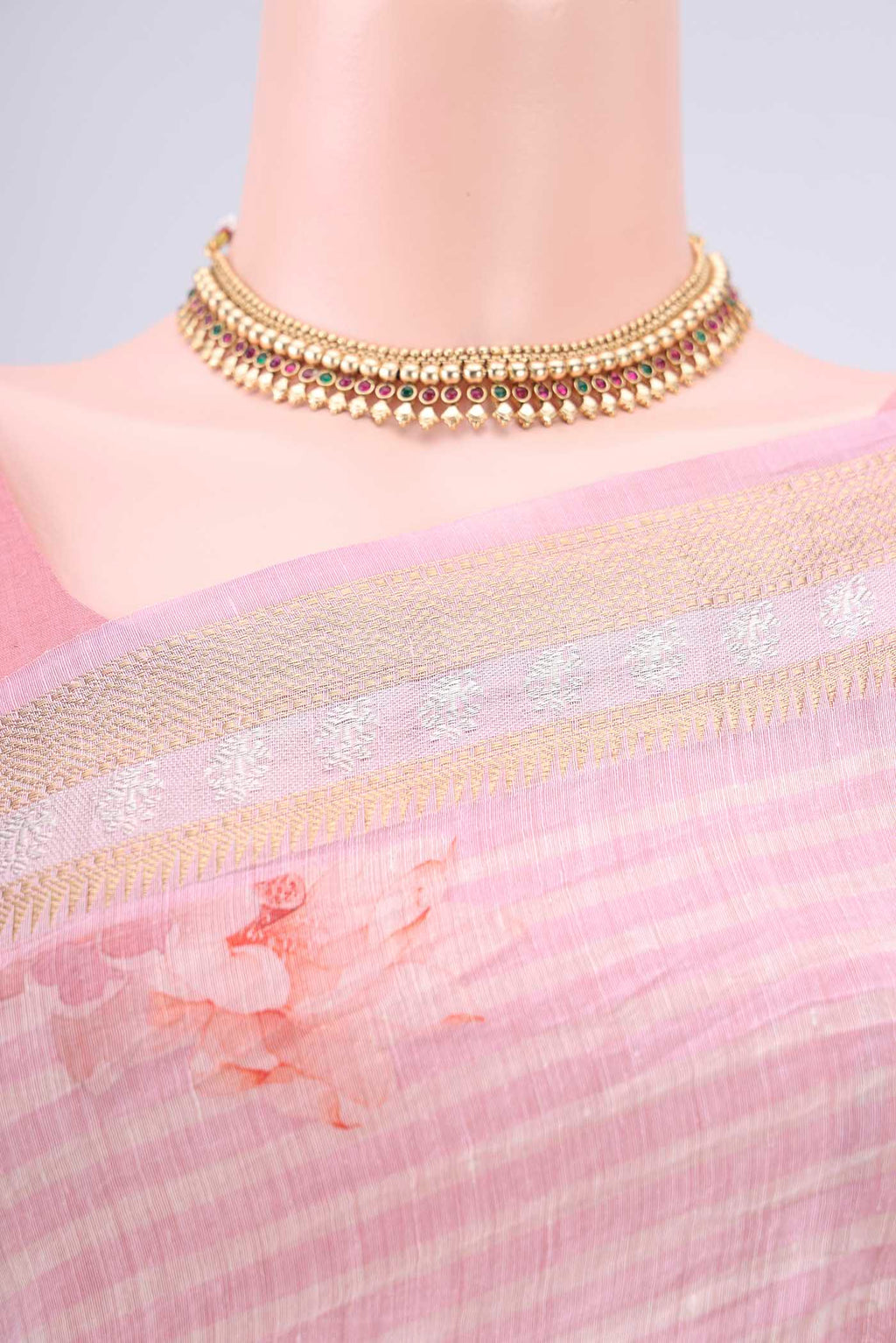 Border image of Off White Linen Saree with Floral Print on the body and Zari Border. 