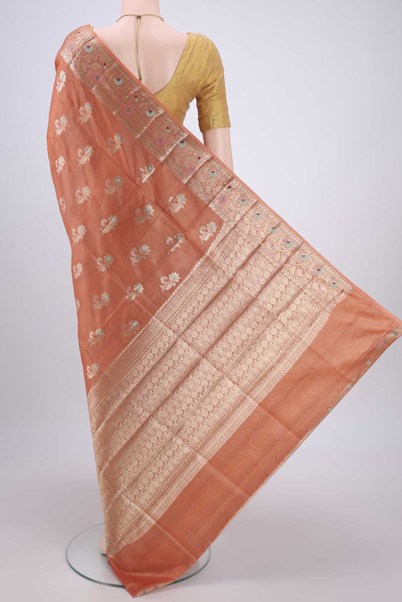 Flat view of Brick Orange Banarasi Tussar Silk Saree with Zari And Thread Butta on the body and Zari And Thread Border. 