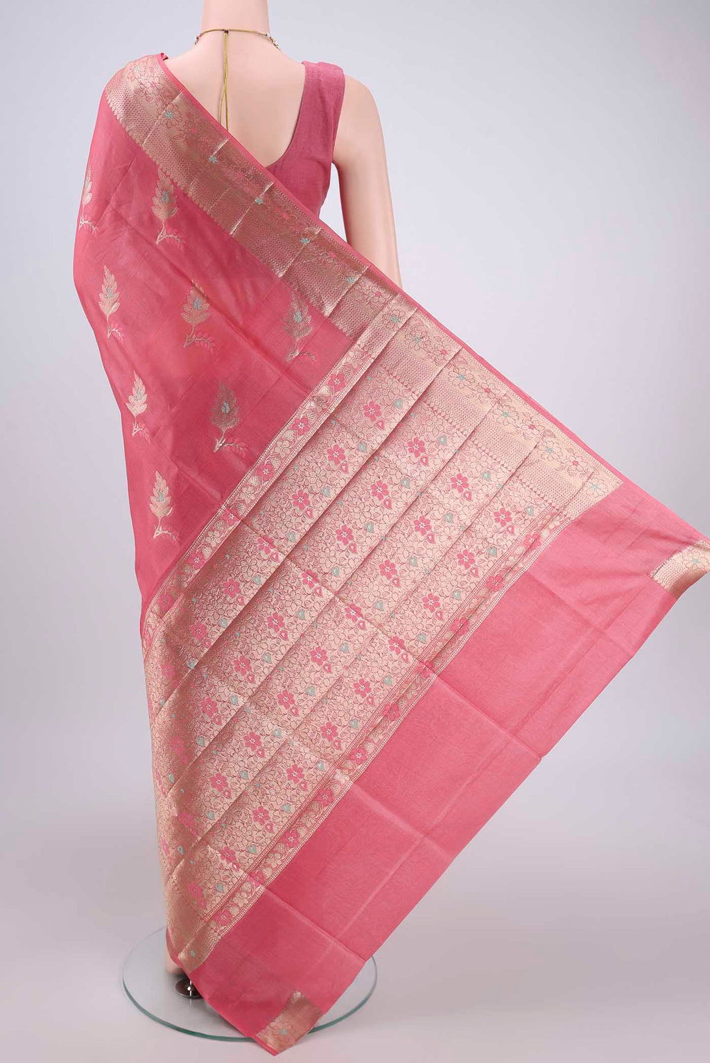 Flat view of Pink Banarasi Raw Silk Saree with Zari And Thread Butta on the body and Zari And Thread Border. 