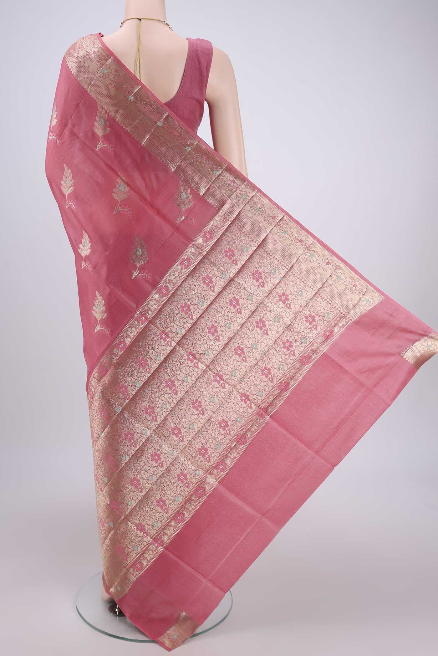 Flat view of Pink Banarasi Raw Silk Saree with Zari And Thread Butta on the body and Zari And Thread Border. 