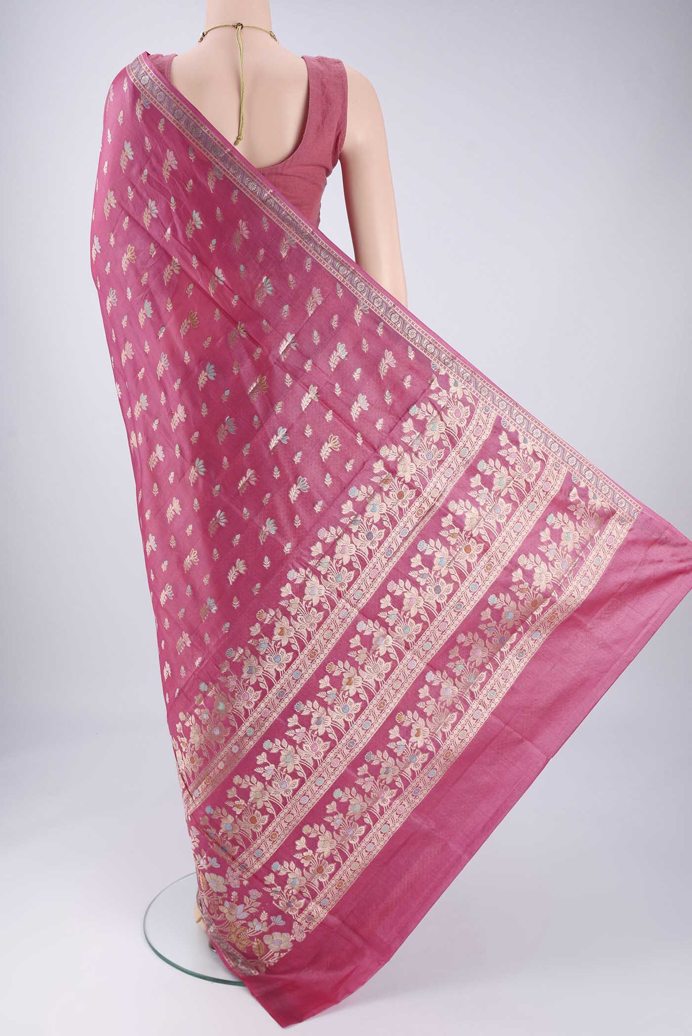 Flat view of Pink Banarasi Tussar Silk Saree with Zari And Thread Butta on the body and Zari And Thread Border. 