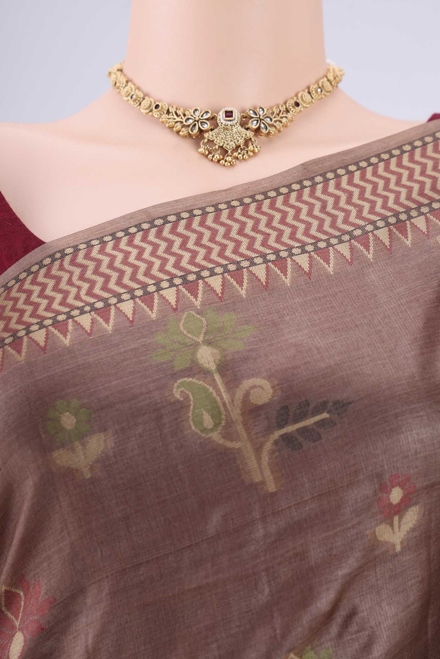Border image of Brown Banarasi Tussar Silk Saree with Zari And Thread Butta on the body and Zari And Thread Border. 