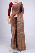 Brown Banarasi Tussar Silk Saree with Zari And Thread Butta on the body and Zari And Thread Border.  displayed on a mannequin