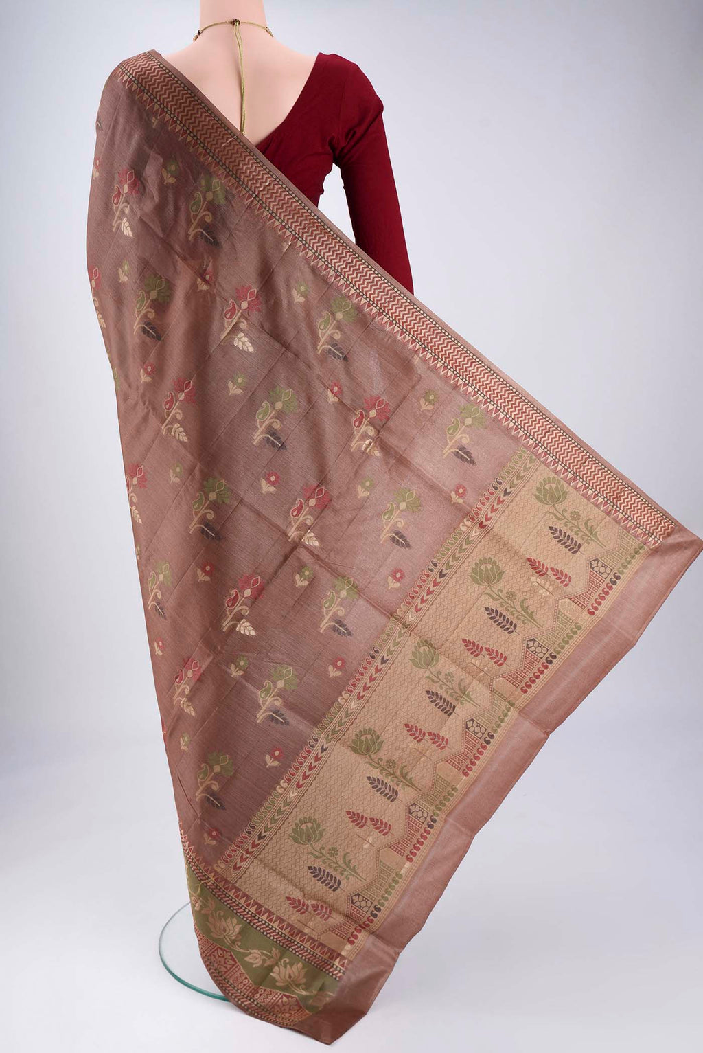 Flat view of Brown Banarasi Tussar Silk Saree with Zari And Thread Butta on the body and Zari And Thread Border. 