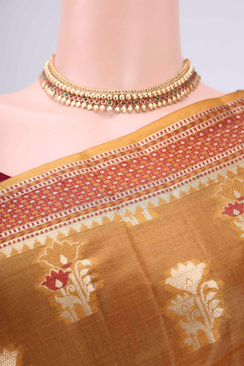 Border image of Mustard Banarasi Tussar Silk Saree with Zari Butta on the body and Zari And Thread Border. 