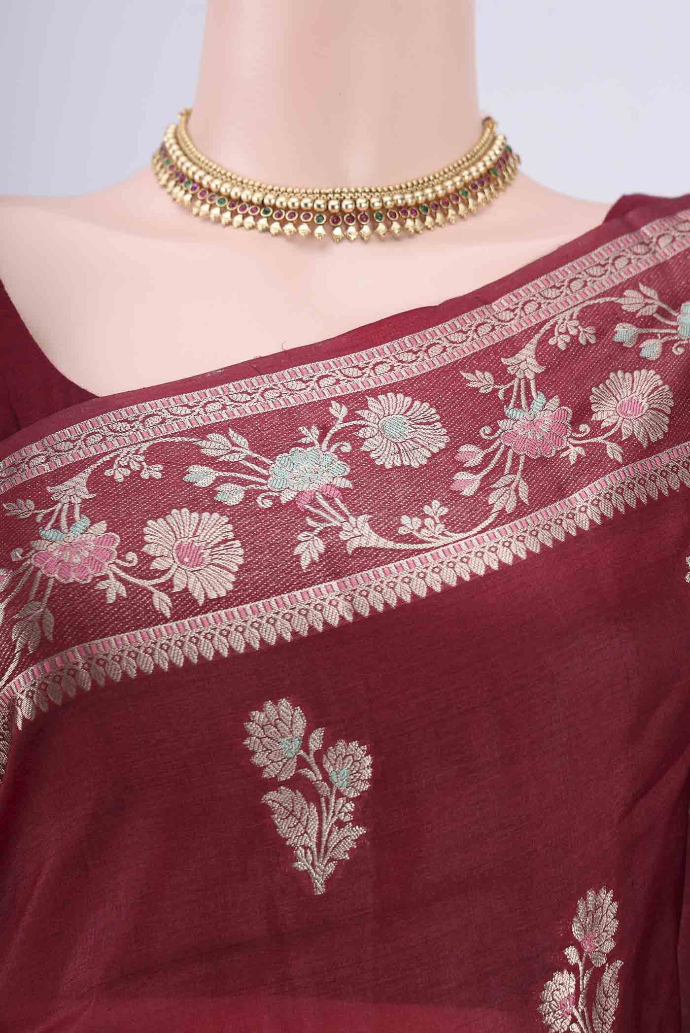 Border image of Maroon Banarasi Tussar Silk Saree with Zari Butta on the body and Zari And Thread Border. 