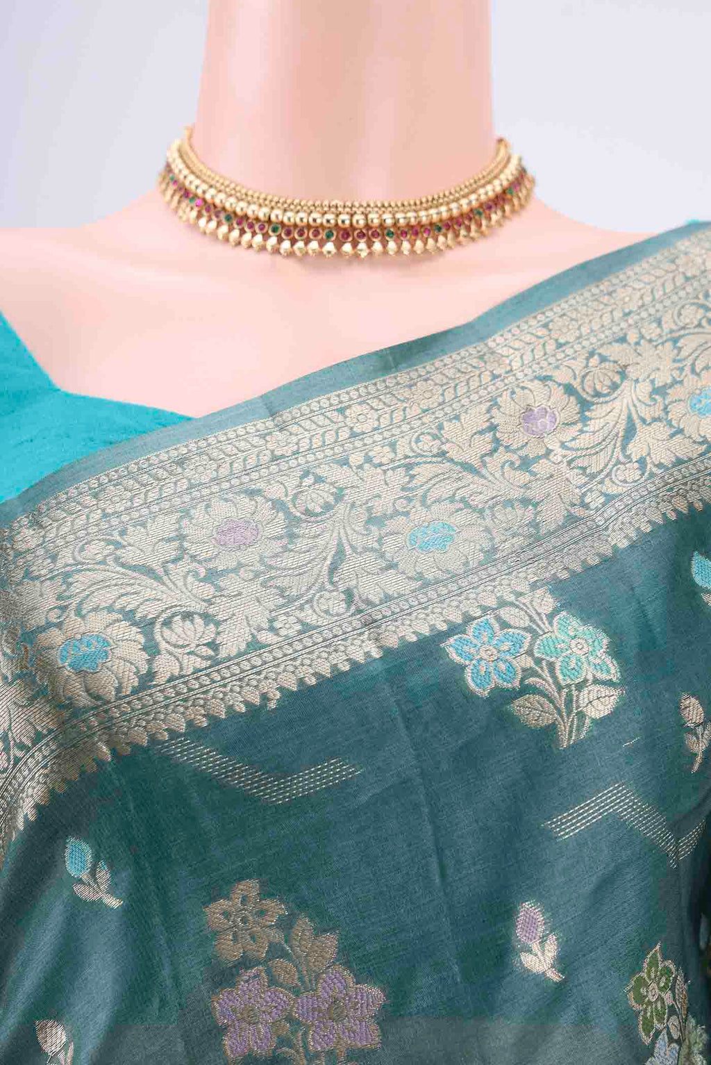 Border image of Maya Blue Banarasi Tussar Silk Saree with Zari And Thread Butta on the body and Zari And Thread Border. 
