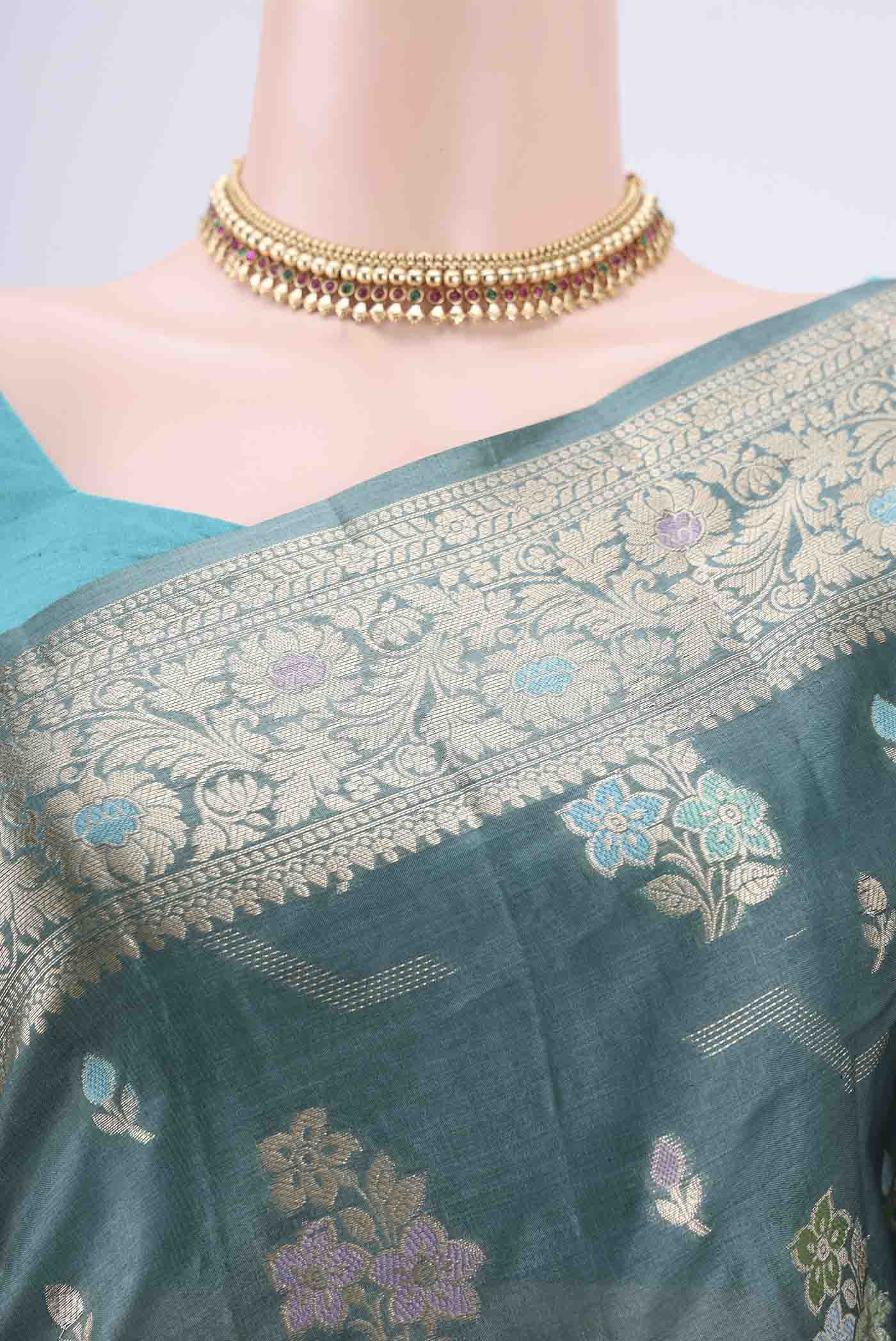 Border image of Maya Blue Banarasi Tussar Silk Saree with Zari And Thread Butta on the body and Zari And Thread Border. 