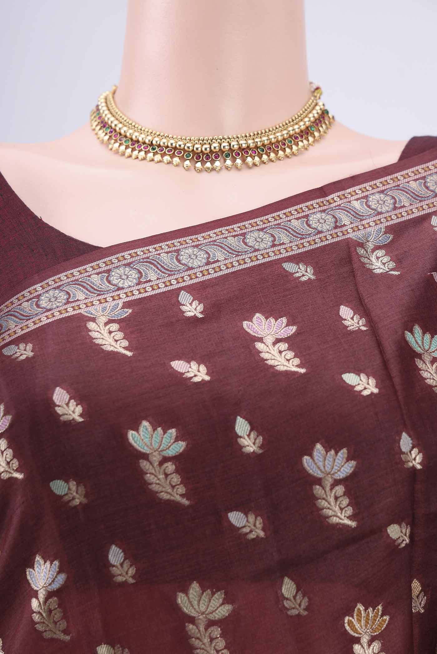 Border image of Brown Banarasi Raw Silk Saree with Zari And Thread Butta on the body and Zari And Thread Border. 