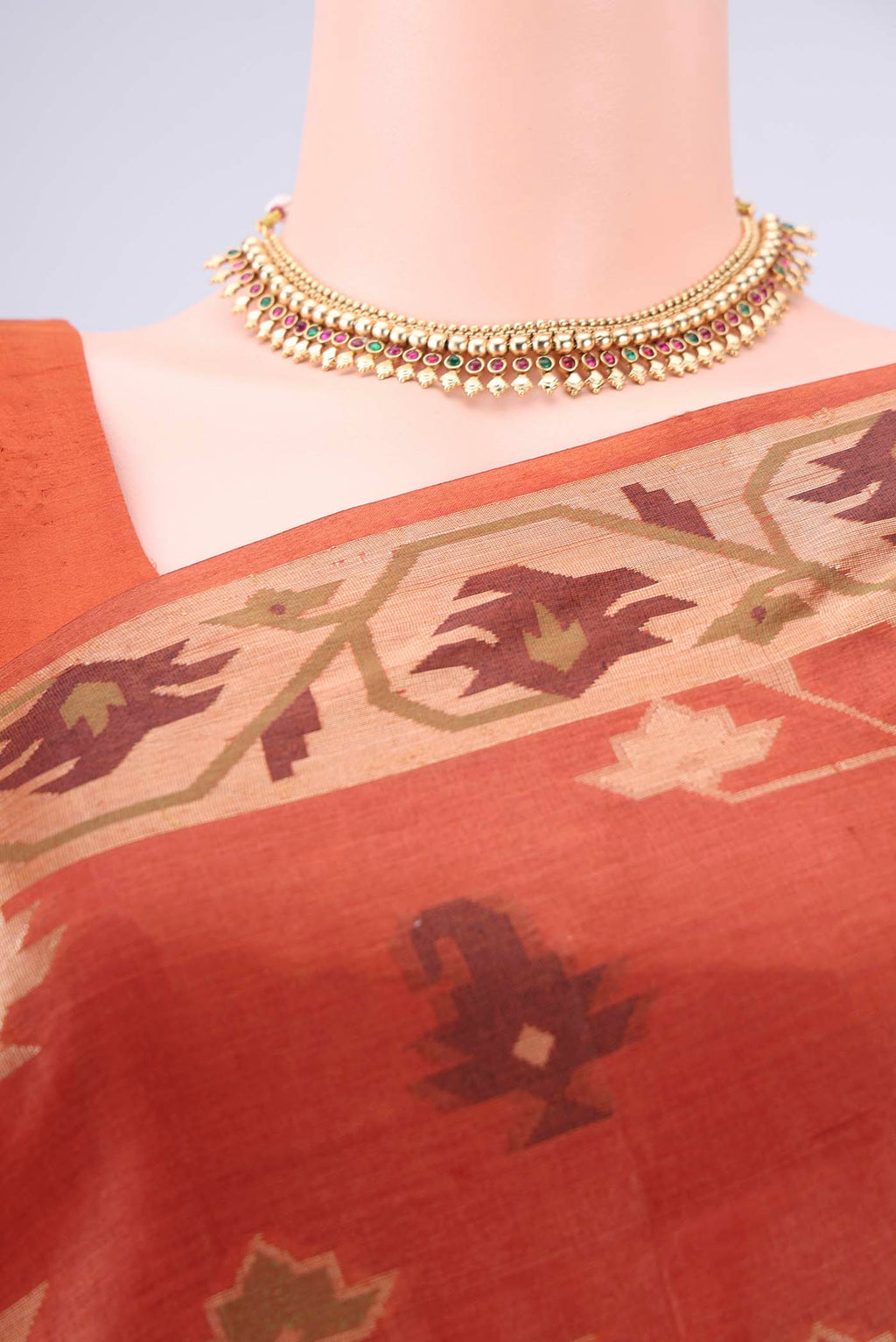 Border image of Rust Banarasi Tussar Silk Saree with Thread Brocade on the body and Temple Border. 
