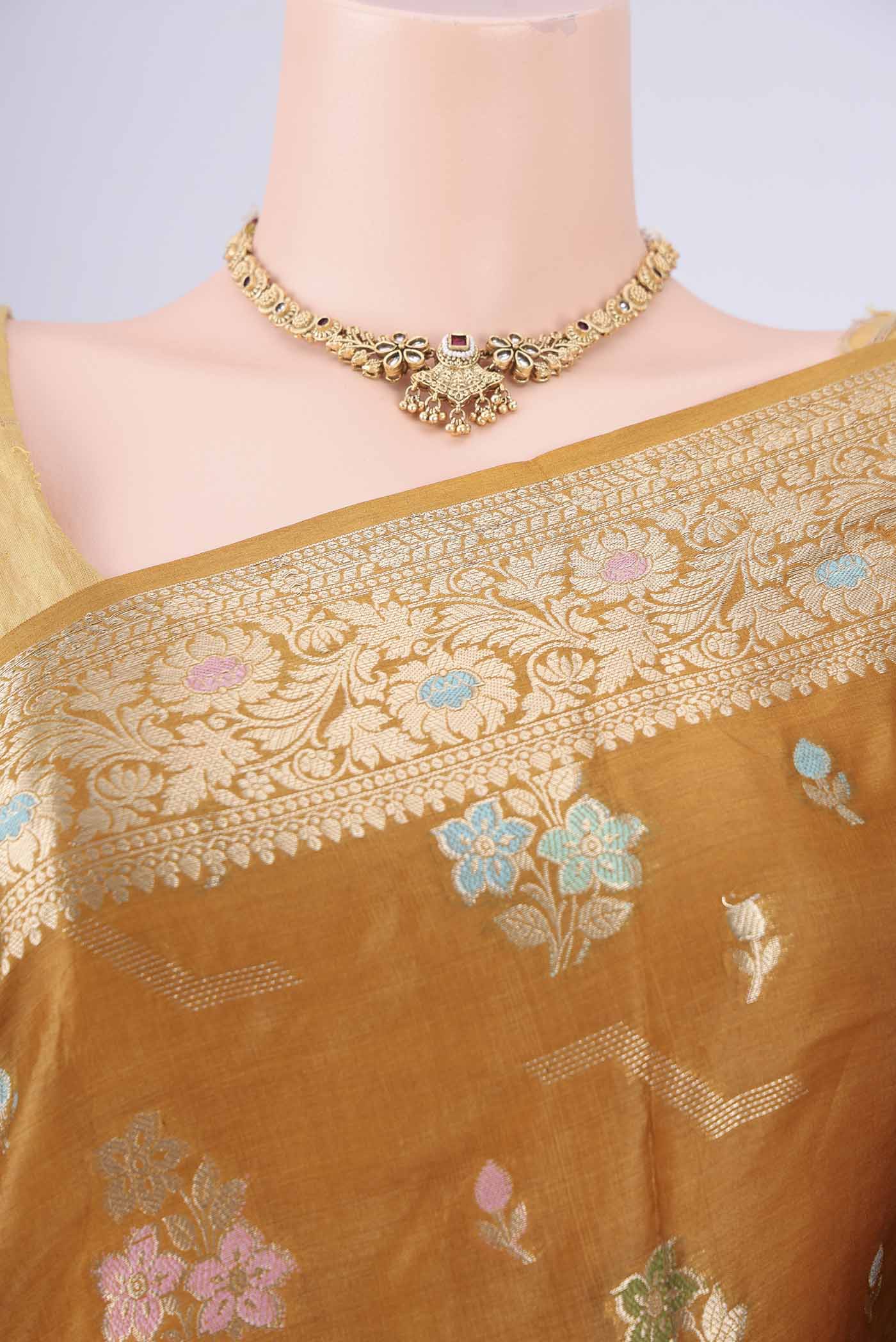Border image of Mustard Banarasi Tussar Silk Saree with Zari And Thread Butta on the body and Zari And Thread Border. 