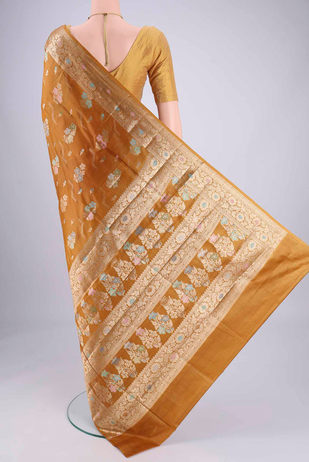 Flat view of Mustard Banarasi Tussar Silk Saree with Zari And Thread Butta on the body and Zari And Thread Border. 
