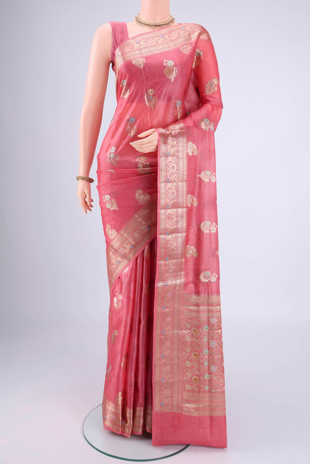 Pink Banarasi Tussar Silk Saree with Zari And Thread Butta on the body and Zari And Thread Border.  displayed on a mannequin