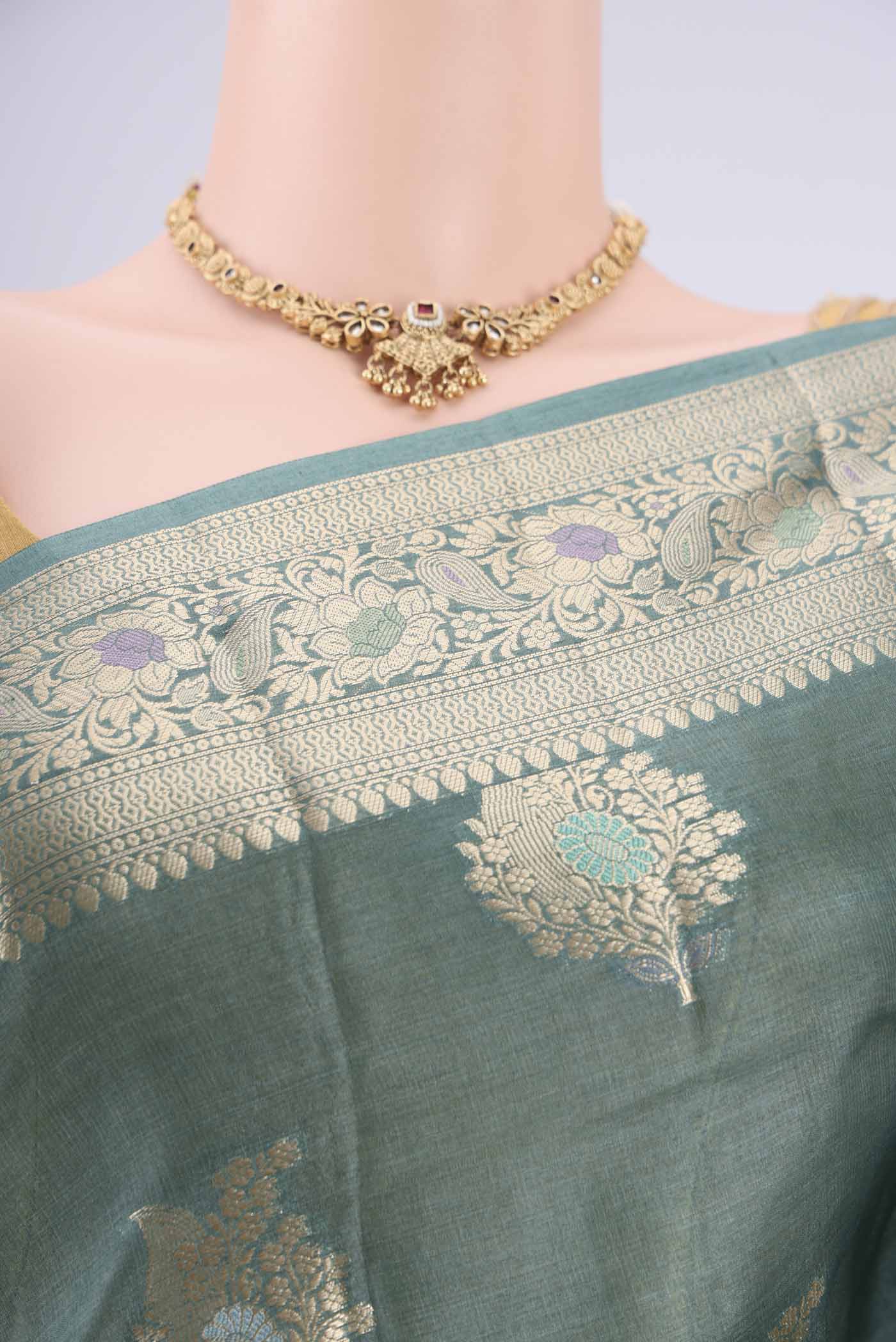 Border image of Maya Blue Banarasi Tussar Silk Saree with Zari And Thread Butta on the body and Zari And Thread Border. 