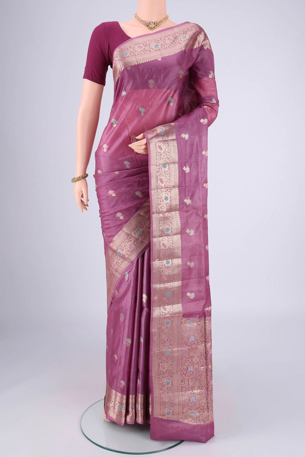 Light Magenta Banarasi Tussar Silk Saree with Zari And Thread Butta on the body and Zari And Thread Border.  displayed on a mannequin