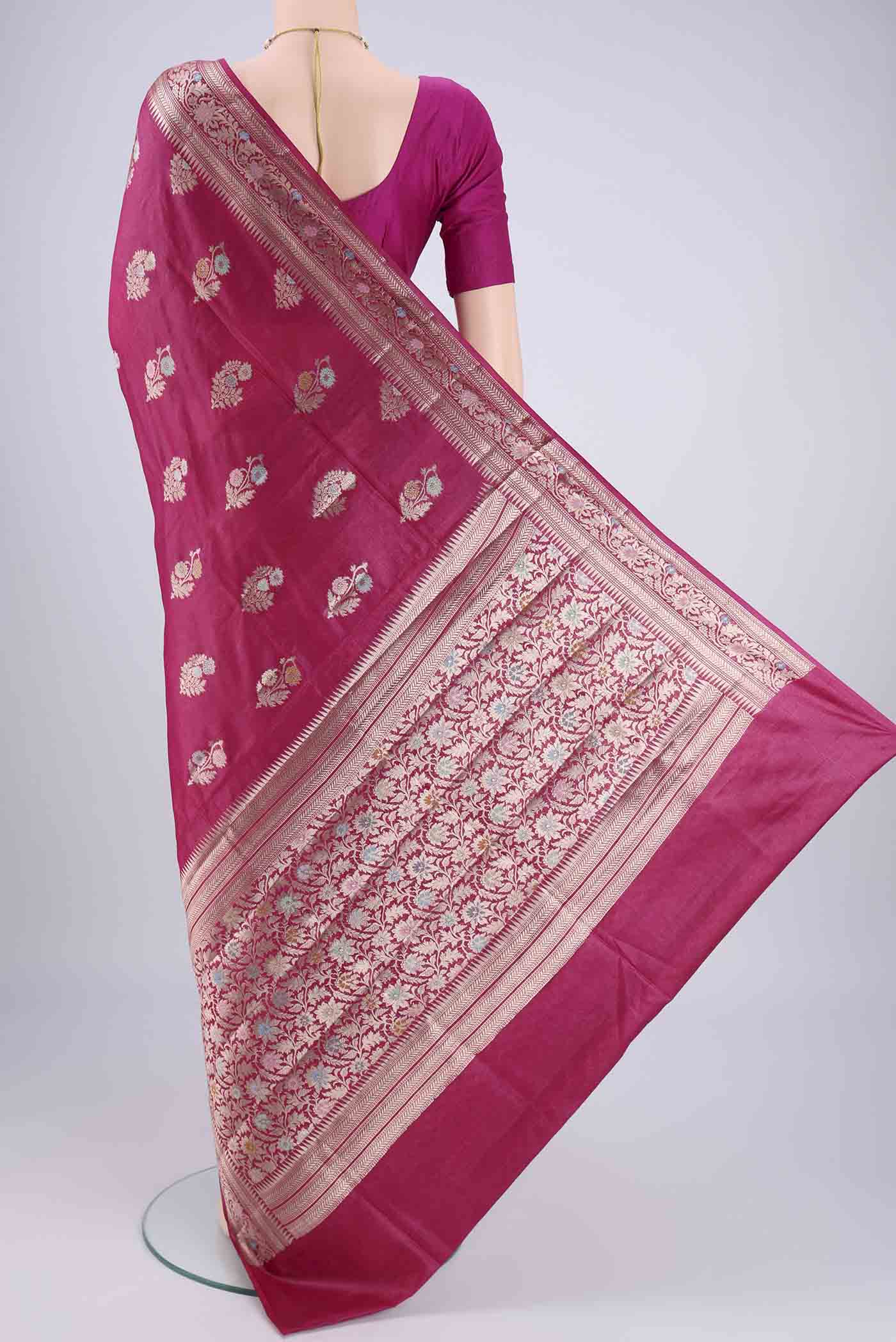 Flat view of Rani Pink Banarasi Tussar Silk Saree with Zari And Thread Butta on the body and Zari And Thread Border. 