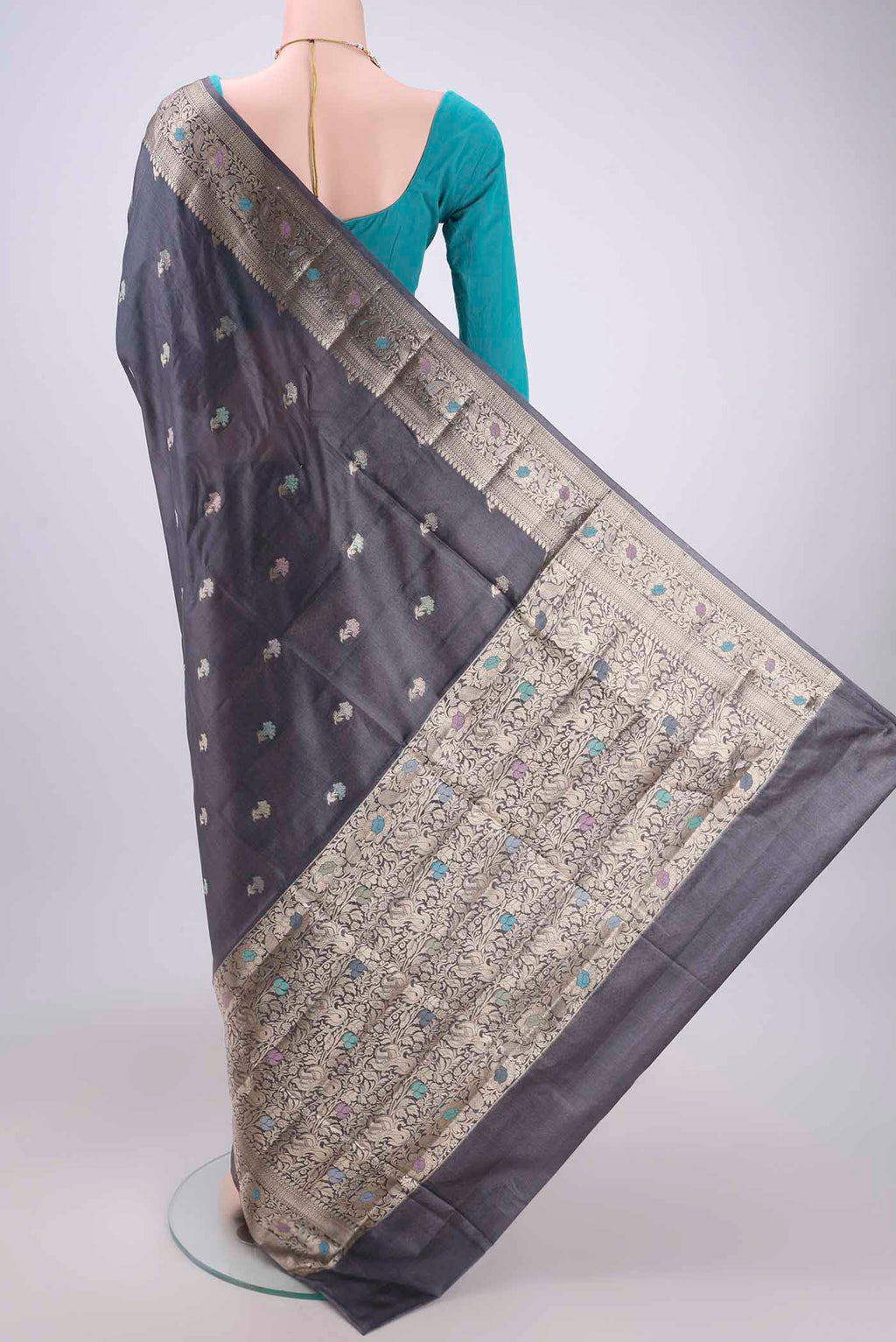 Flat view of Davys Grey Banarasi Tussar Silk Saree with Zari And Thread Butta on the body and Zari And Thread Border. 
