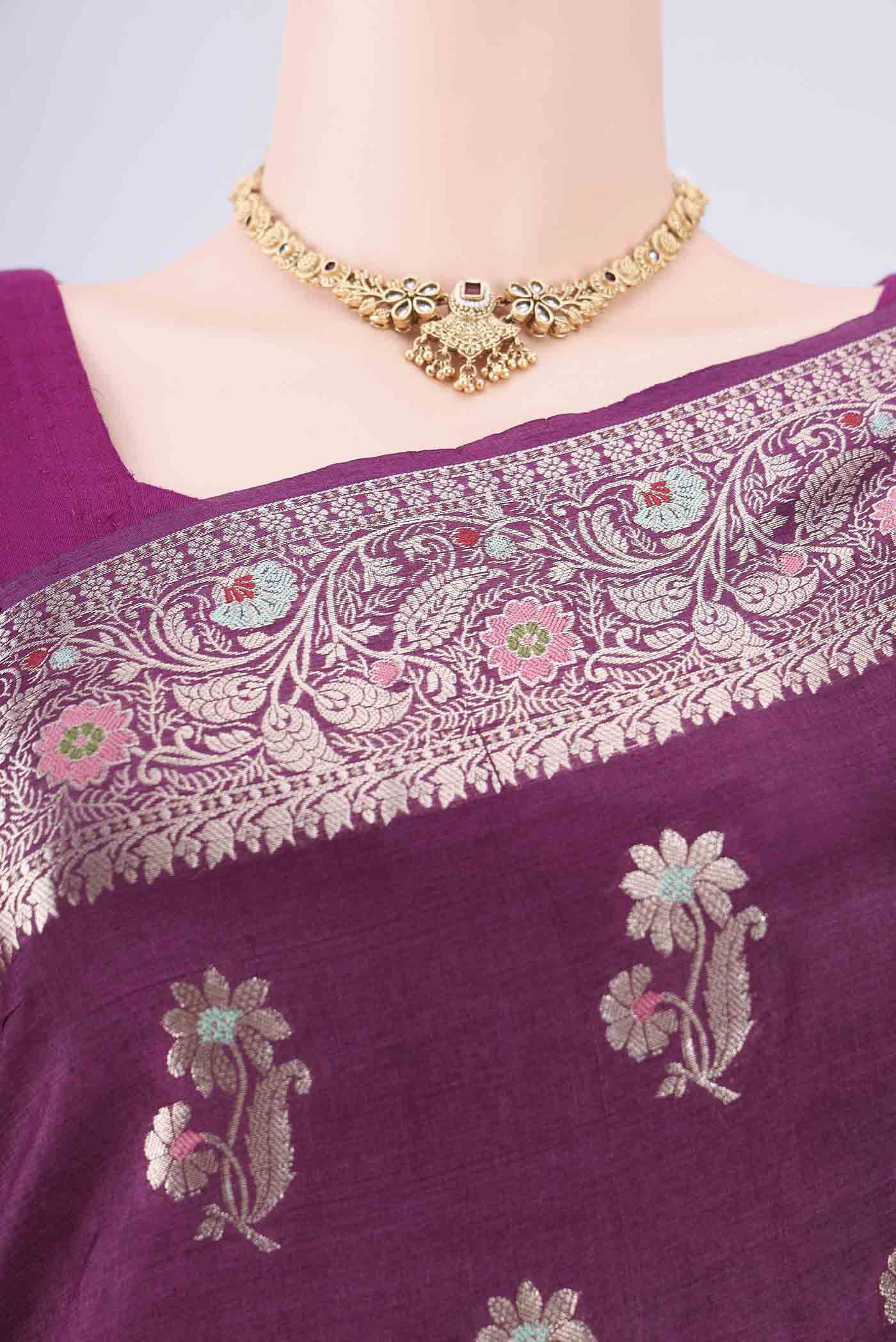 Border image of Burgundy Banarasi Tussar Silk Saree with Zari And Thread Butta on the body and Zari Border. 
