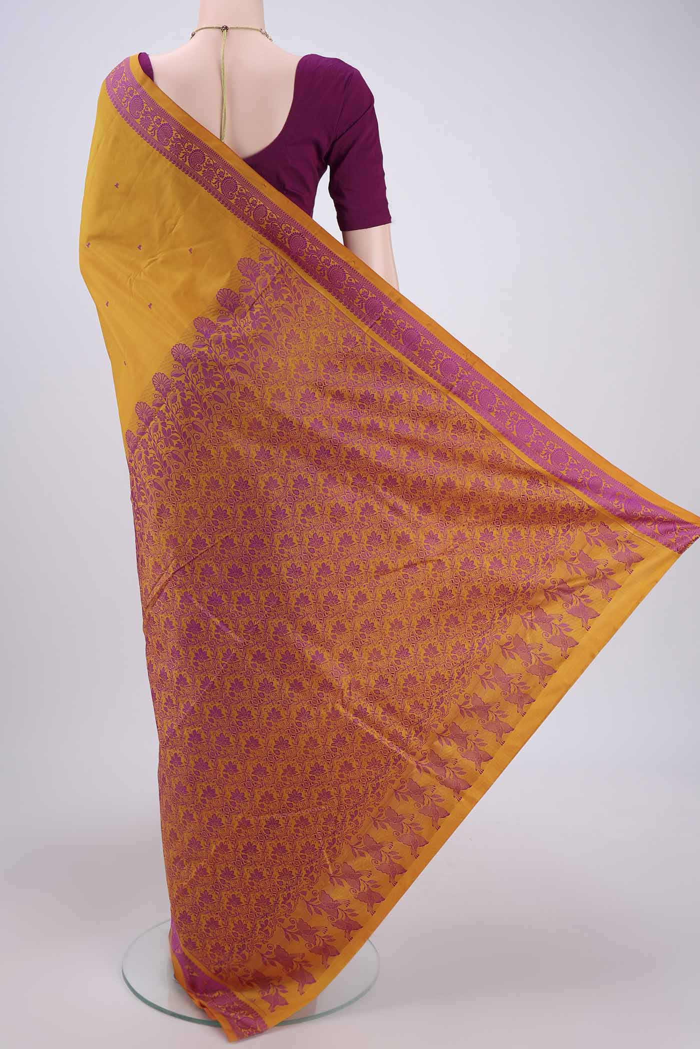 Flat view of Mustard Kanchipuram Silk Saree with Thread Butta on the body and Thread Border. 