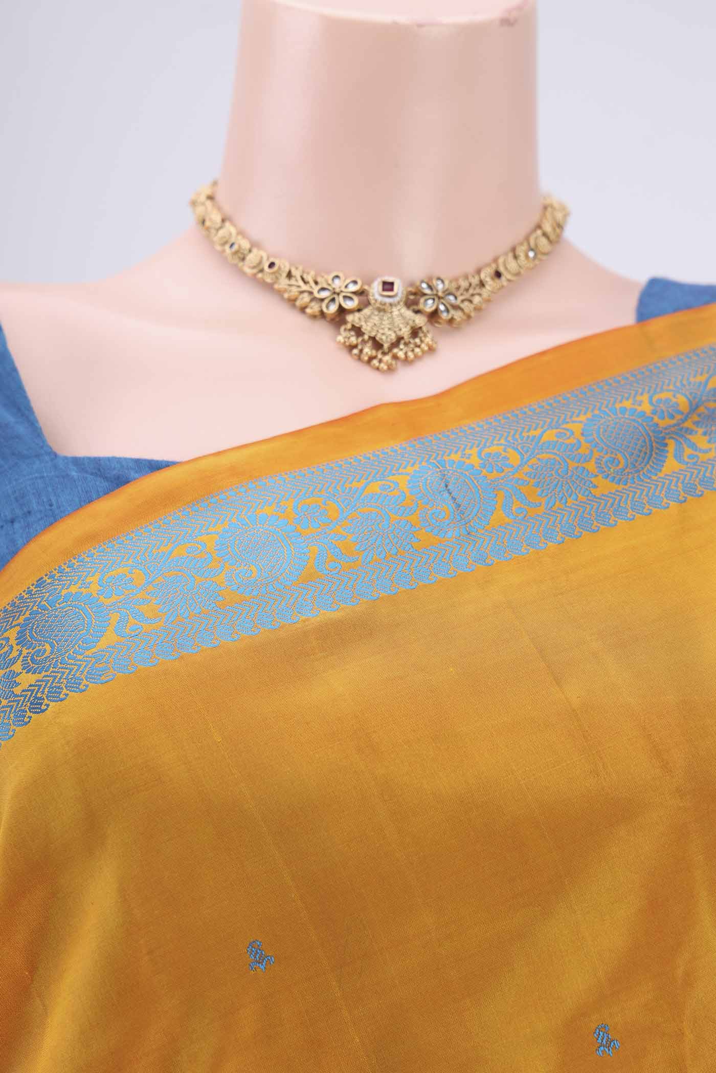 Border image of Yellow Kanchipuram Silk Saree with Thread Butta on the body and Thread Border. 