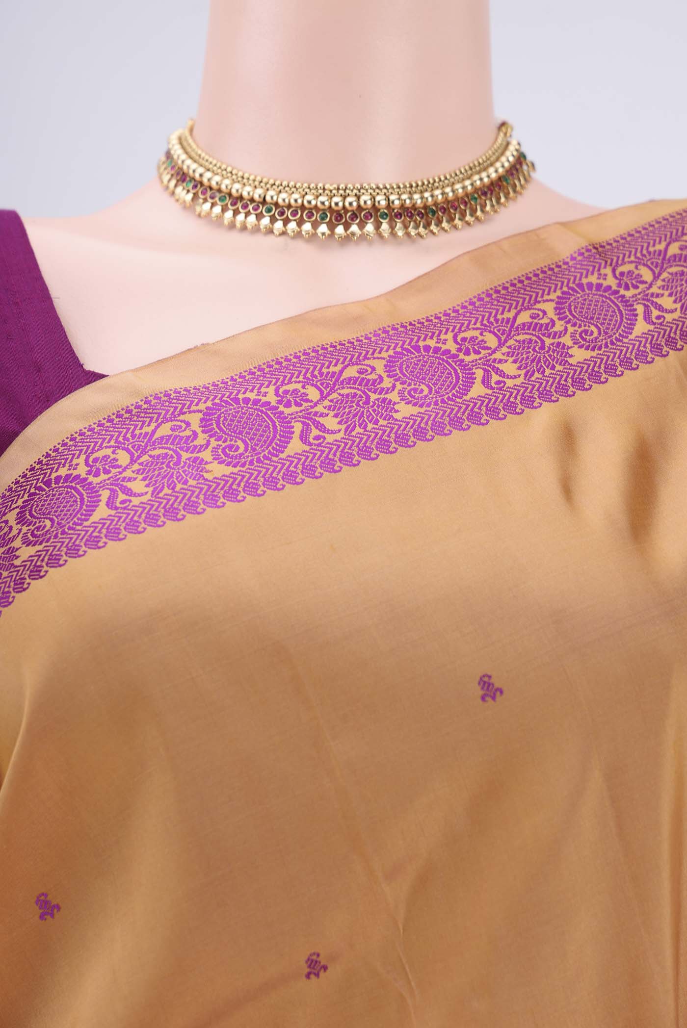 Border image of Sandal Kanchipuram Silk Saree with Thread Butta on the body and Thread Border. 
