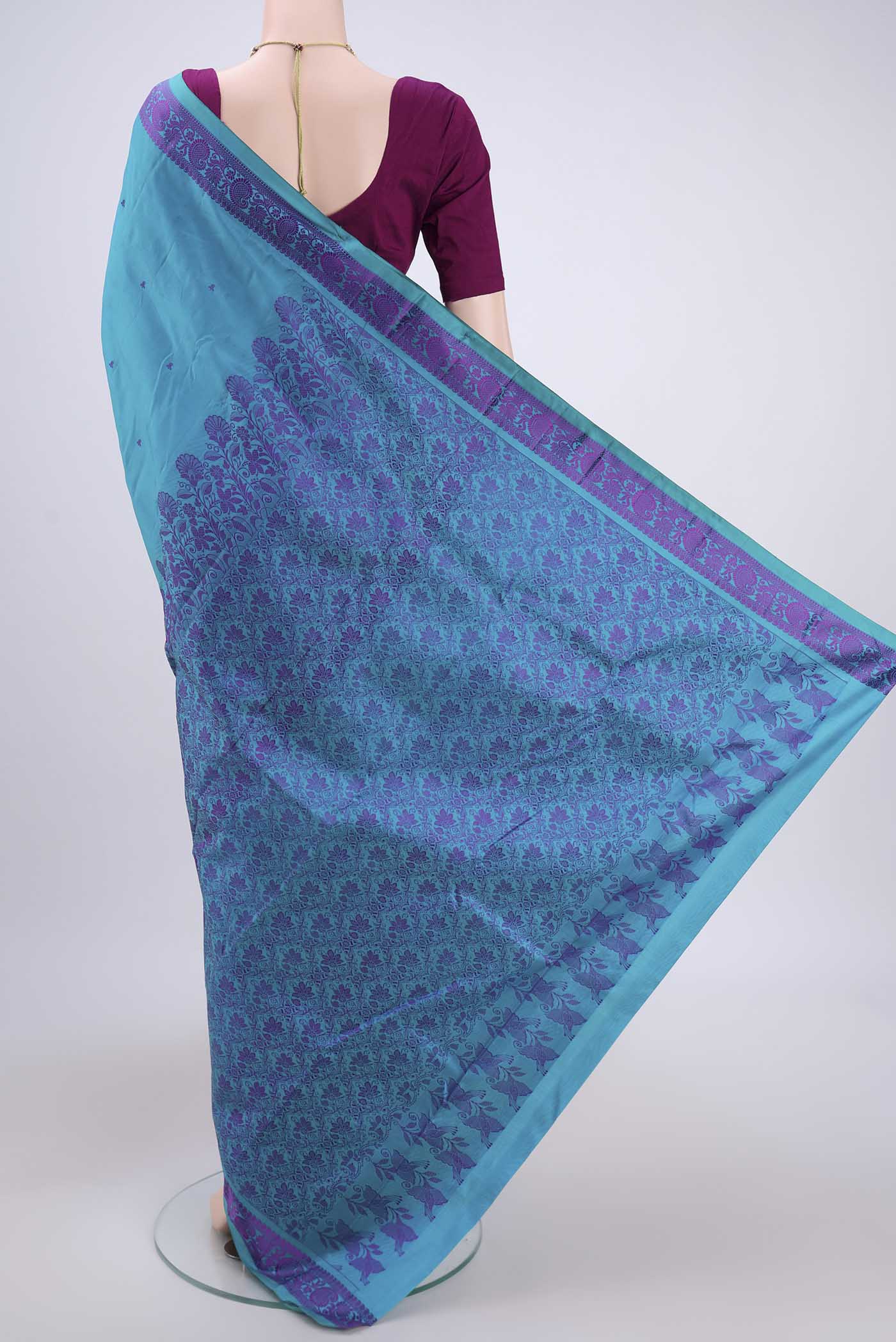 Flat view of Blue Kanchipuram Silk Saree with Thread Butta on the body and Thread Border. 