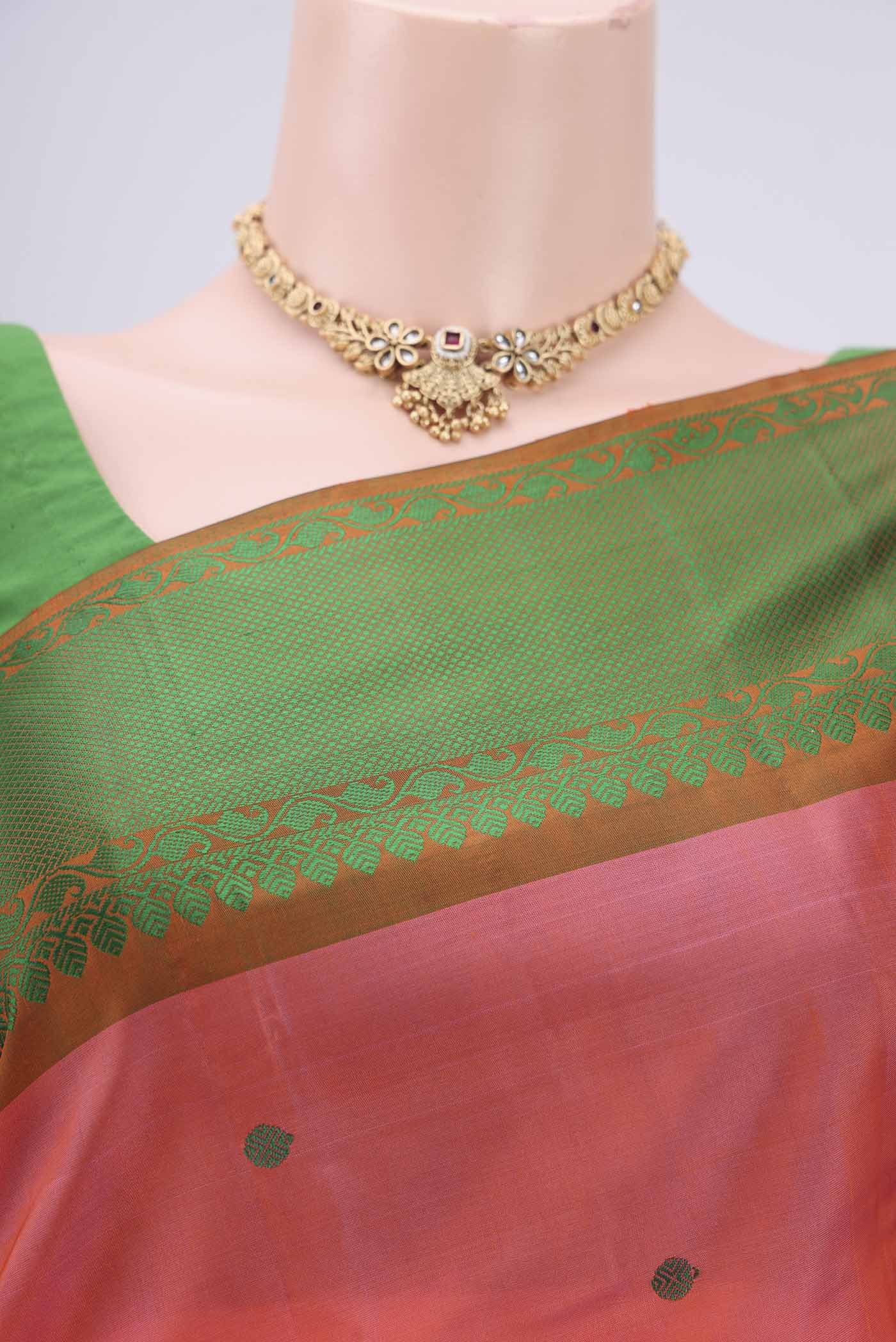 Border image of Peach Kanchipuram Silk Saree with Thread Butta on the body and Thread Border. 