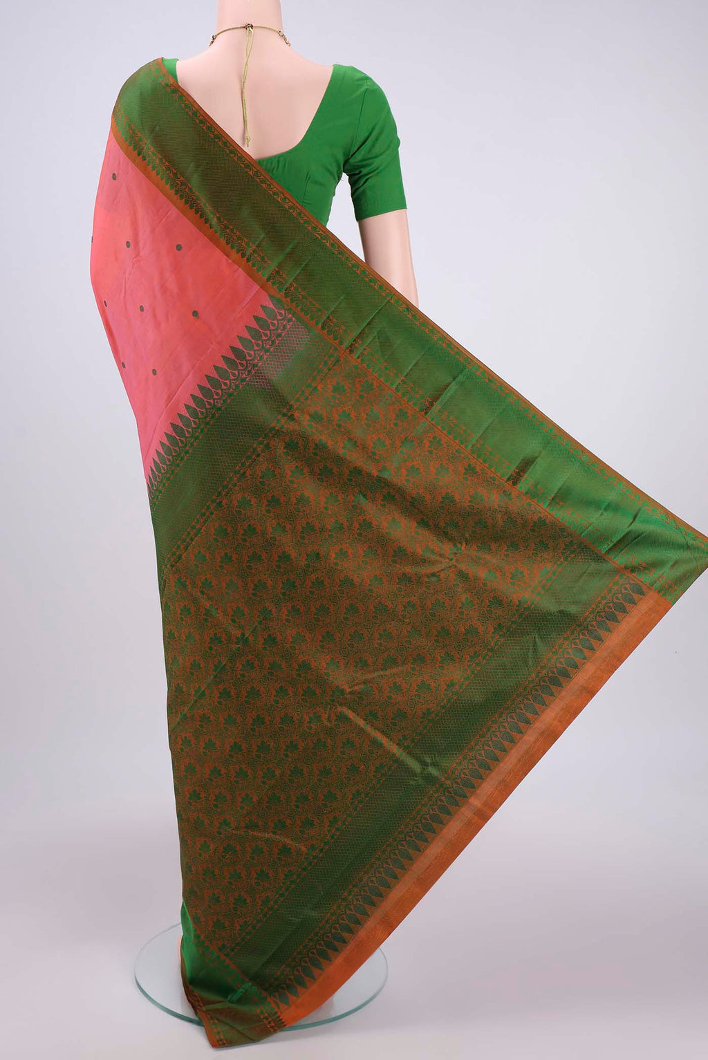 Flat view of Peach Kanchipuram Silk Saree with Thread Butta on the body and Thread Border. 