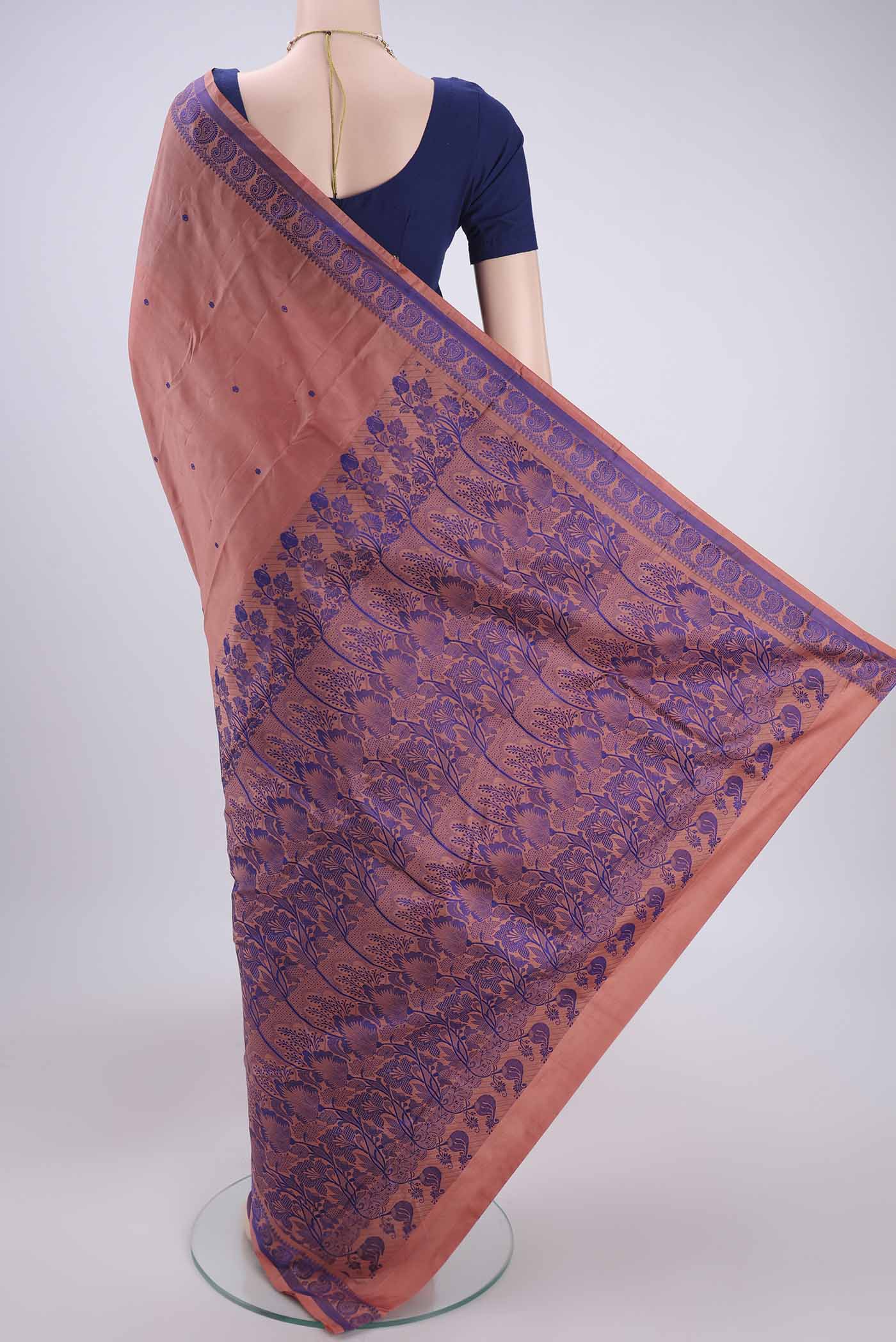 Flat view of Coral Dual Tone Kanchipuram Silk Saree with Thread Butta on the body and Thread Border. 