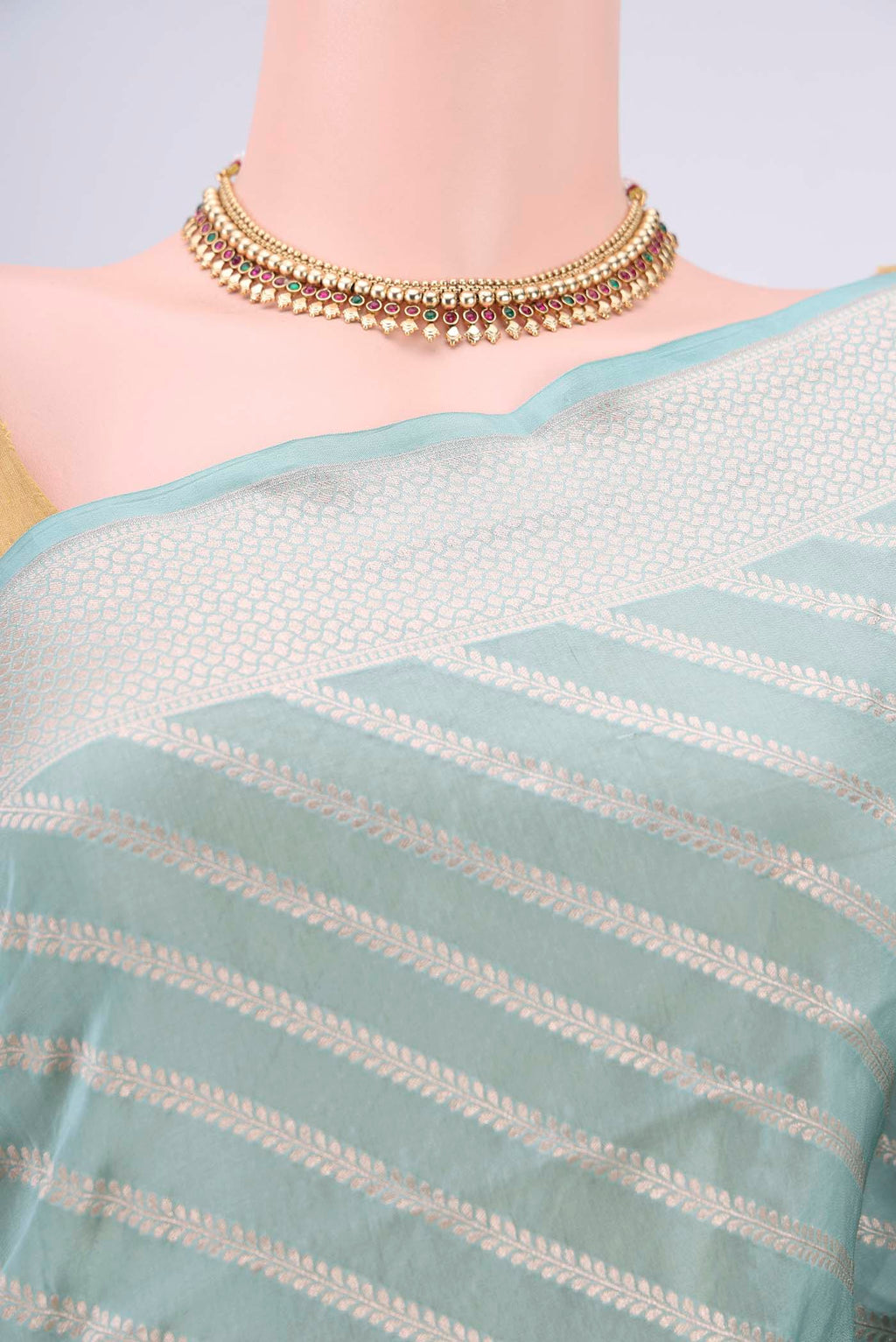 Border image of Sea Green Dual Tone Banarasi Silk Saree with Stripes on the body and Zari Border. 