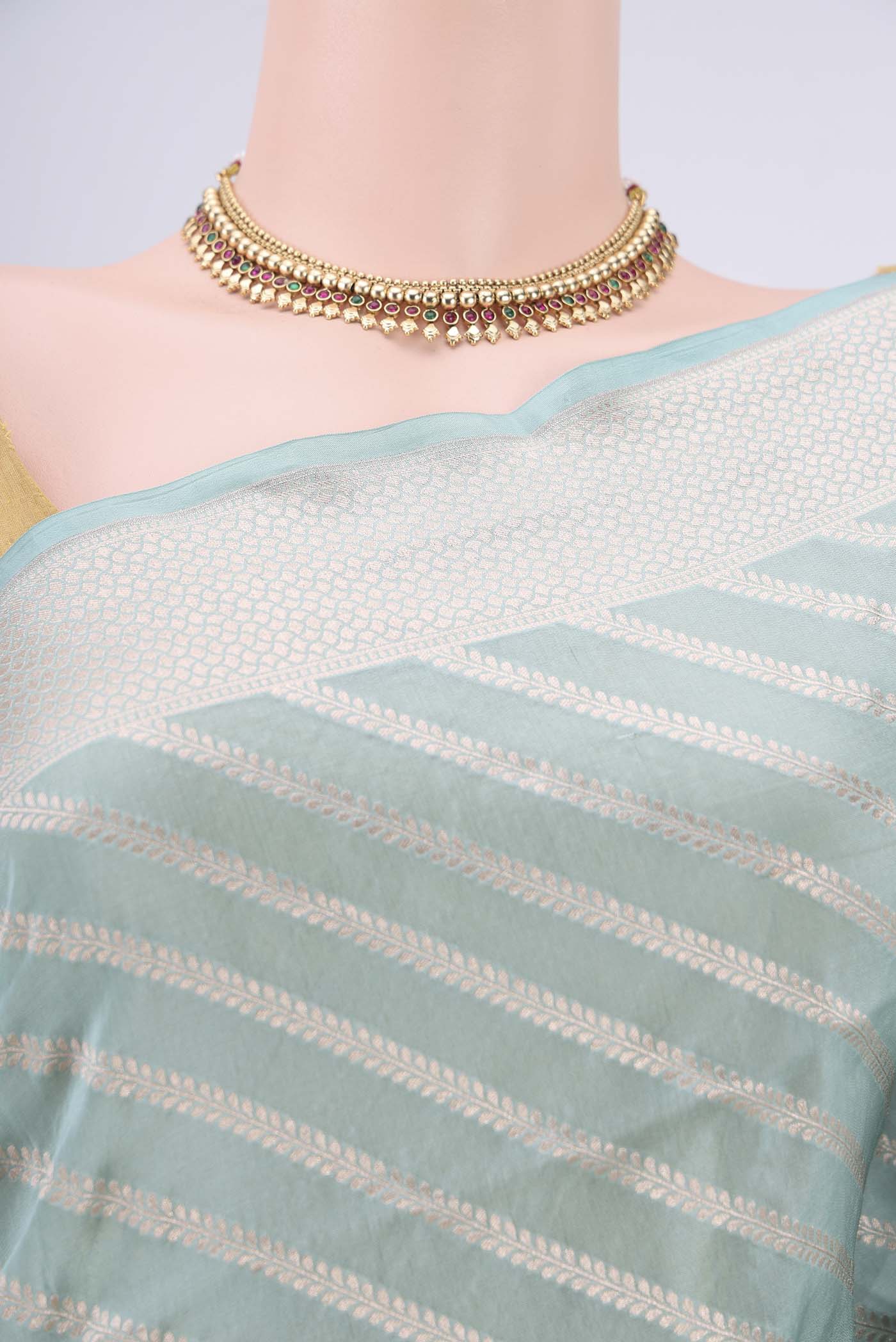 Border image of Sea Green Dual Tone Banarasi Silk Saree with Stripes on the body and Zari Border. 