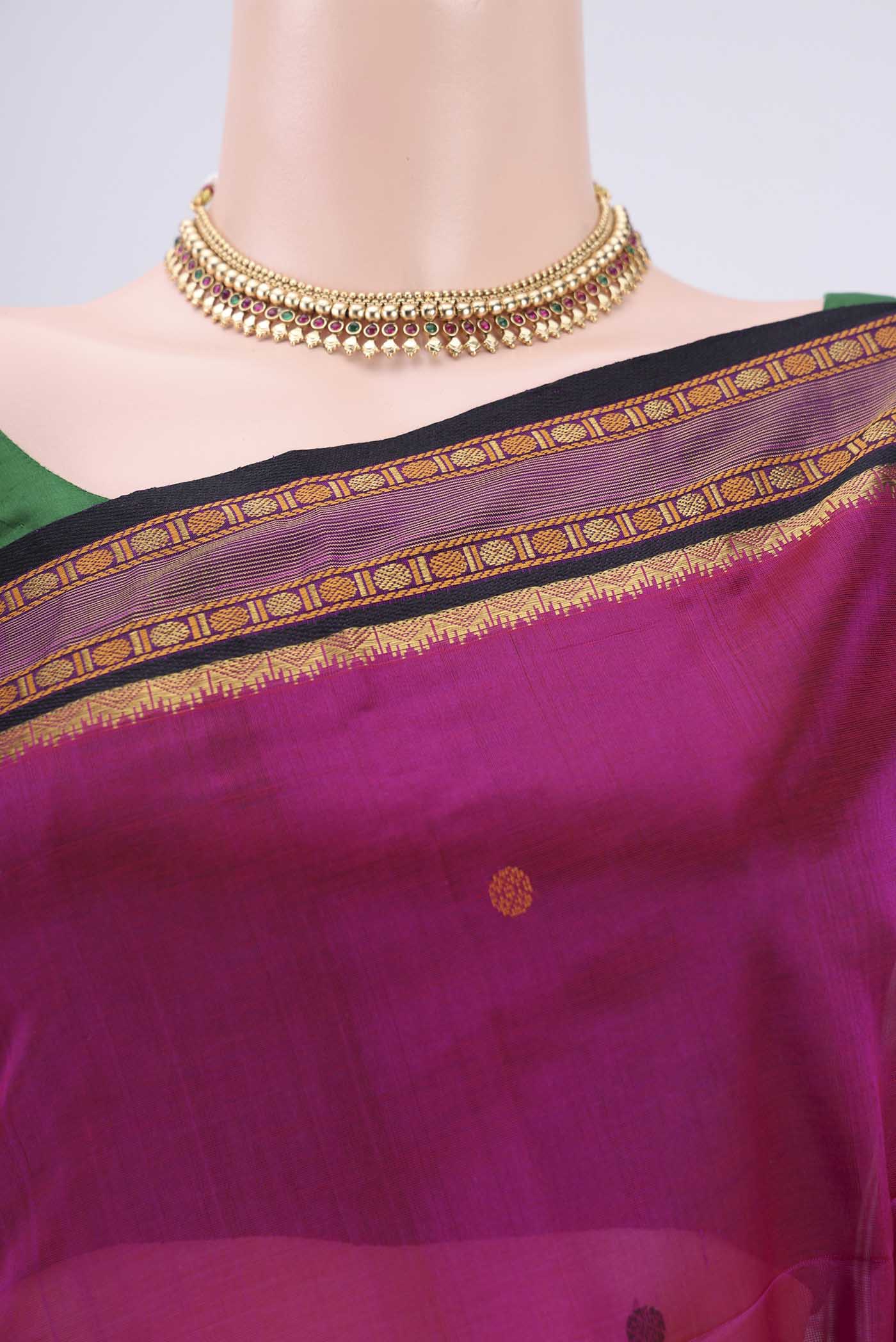 Border image of Rani Pink Silk Cotton Saree with Thread Butta on the body and Zari And Thread Border. 