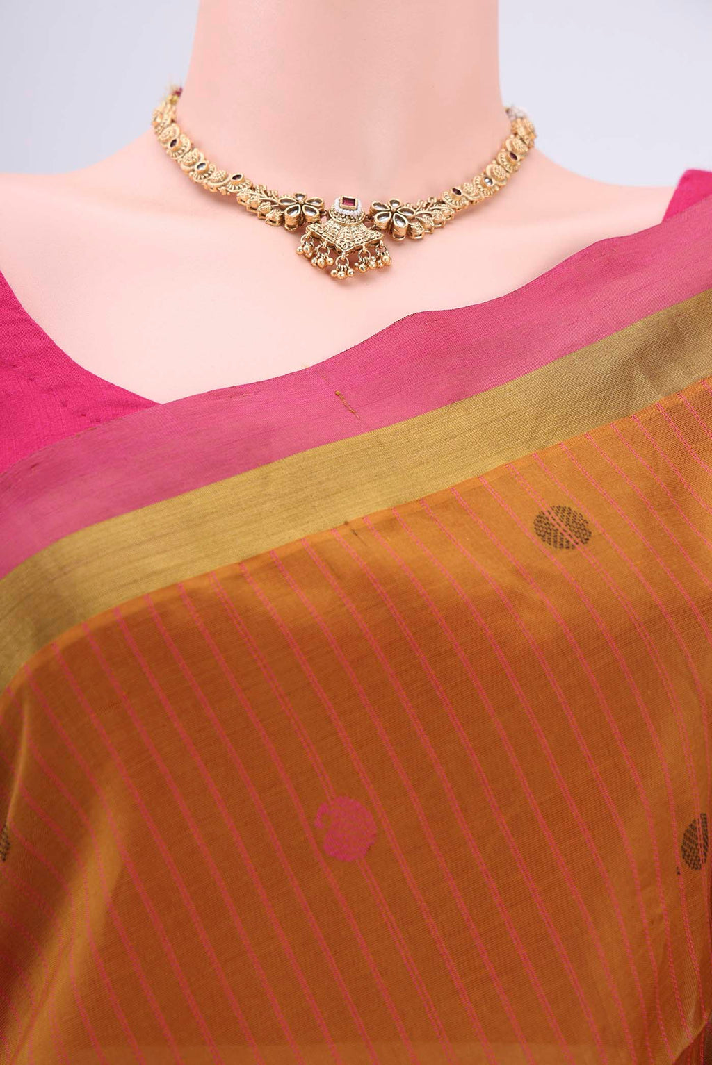 Border image of Mustard Coimbatore Silk Cotton Saree with Stripes on the body and Plain Border. 