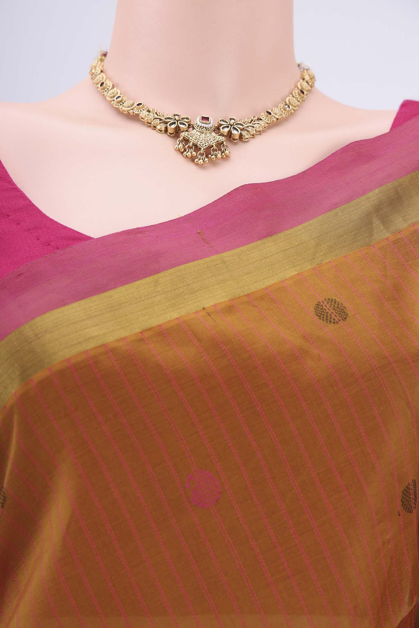 Border image of Mustard Coimbatore Silk Cotton Saree with Stripes on the body and Plain Border. 