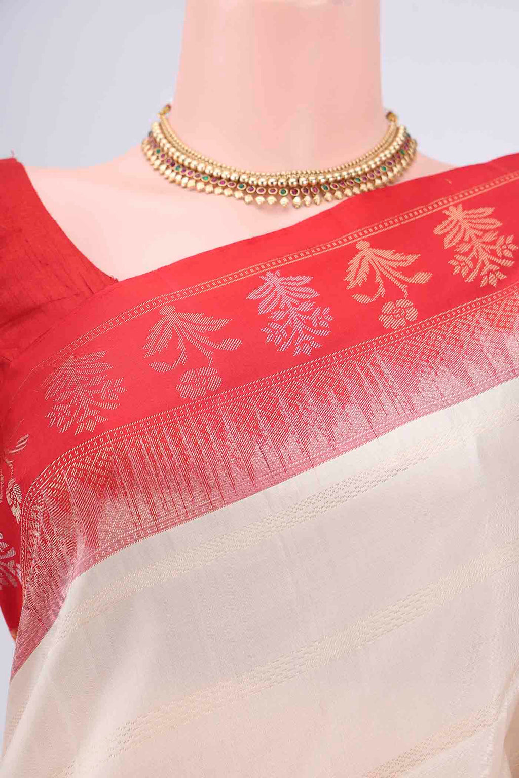 Border image of Off White Soft Silk Saree with Stripes on the body and Zari Border. 