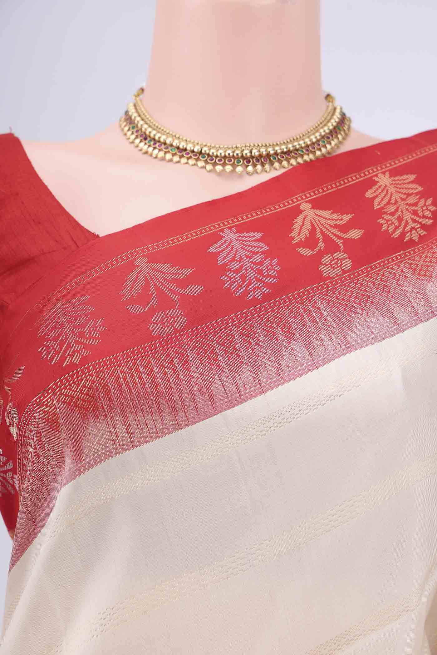 Border image of Off White Soft Silk Saree with Stripes on the body and Zari Border. 