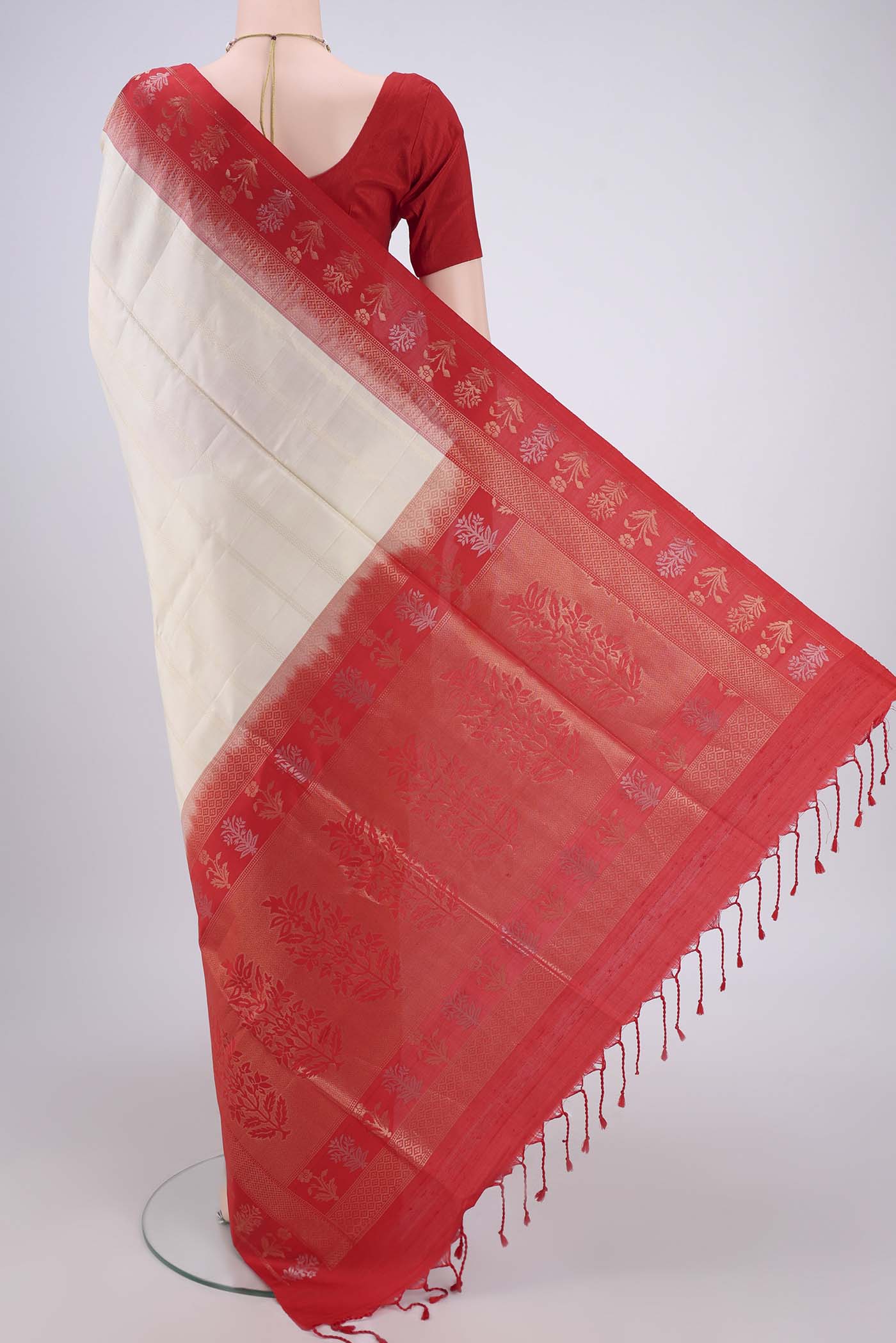 Flat view of Off White Soft Silk Saree with Stripes on the body and Zari Border. 