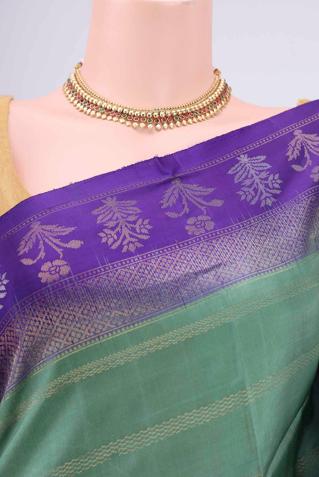 Border image of Sage Green Soft Silk Saree with Stripes on the body and Zari Border. 