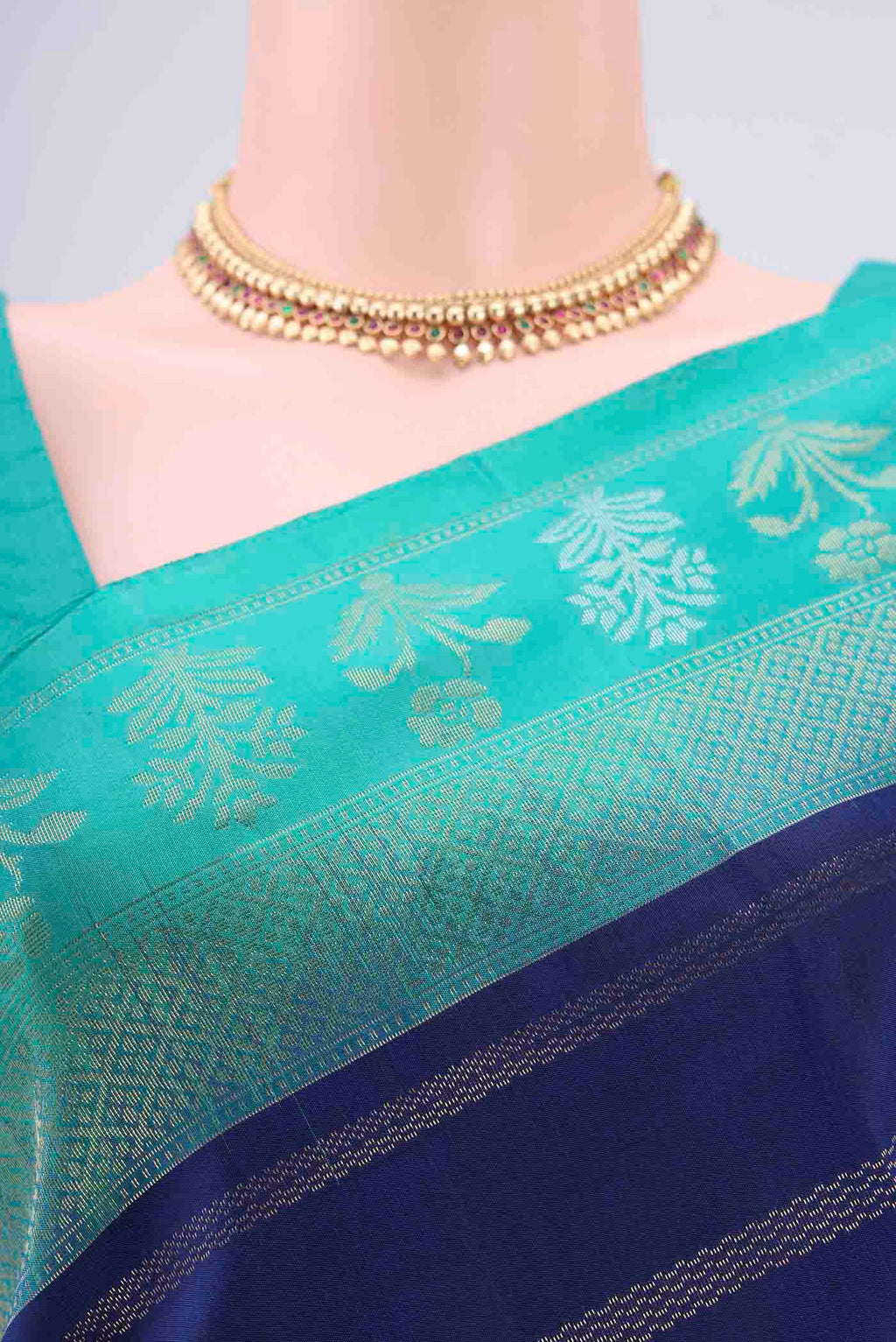 Border image of Navy Blue Soft Silk Saree with Stripes on the body and Zari Border. 