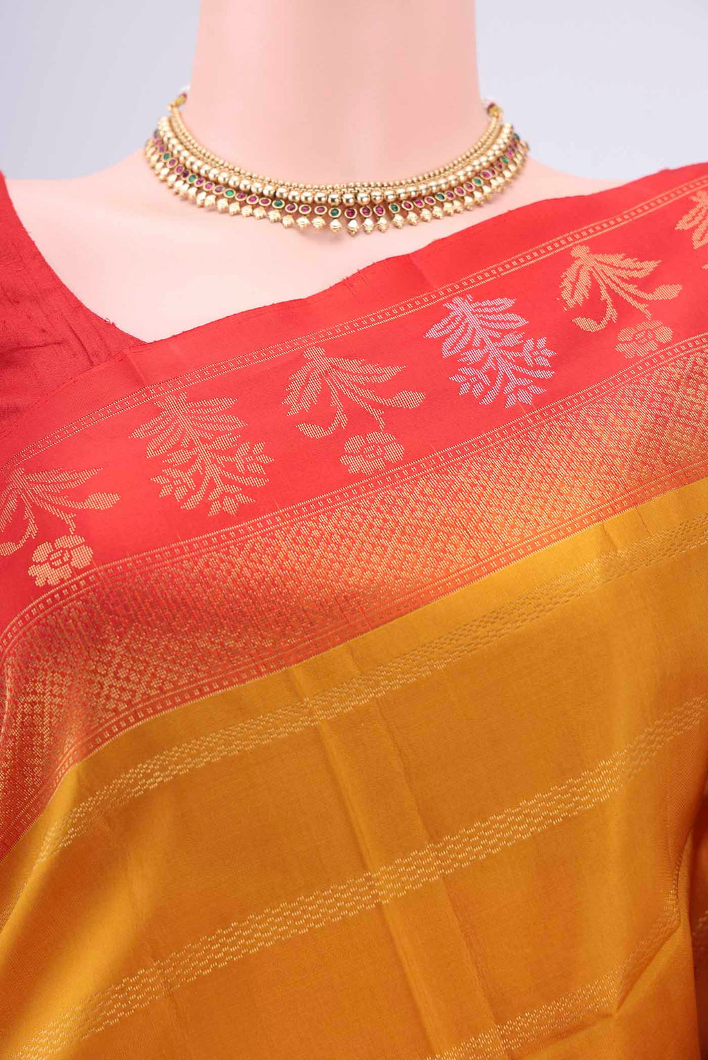 Border image of Mustard Soft Silk Saree with Stripes on the body and Zari Border. 