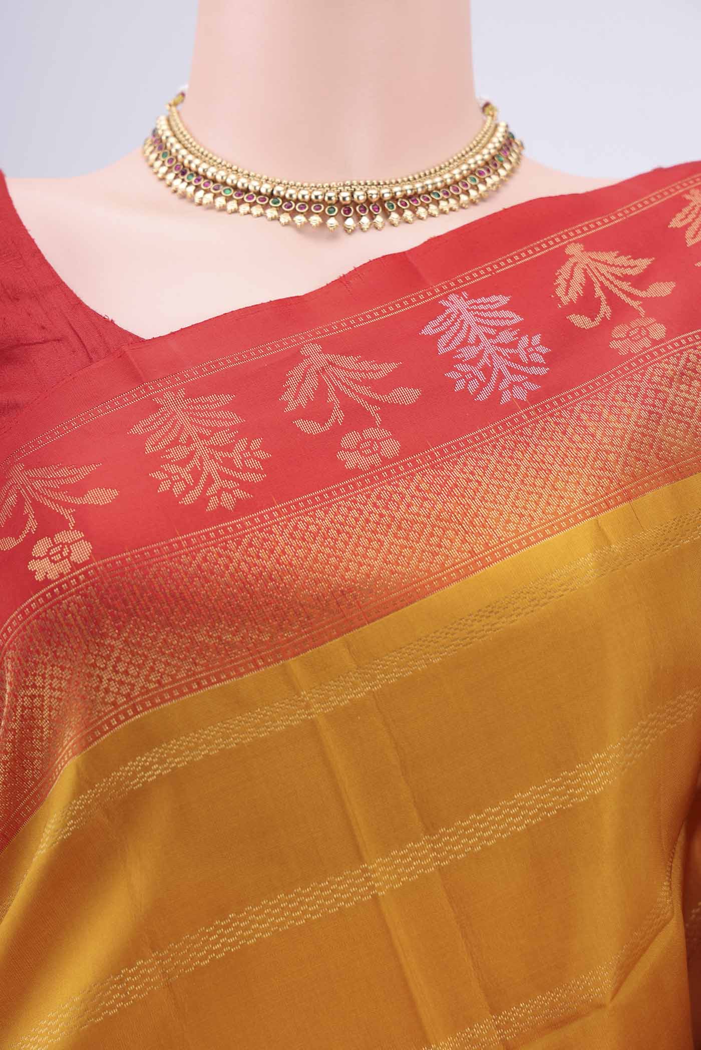 Border image of Mustard Soft Silk Saree with Stripes on the body and Zari Border. 