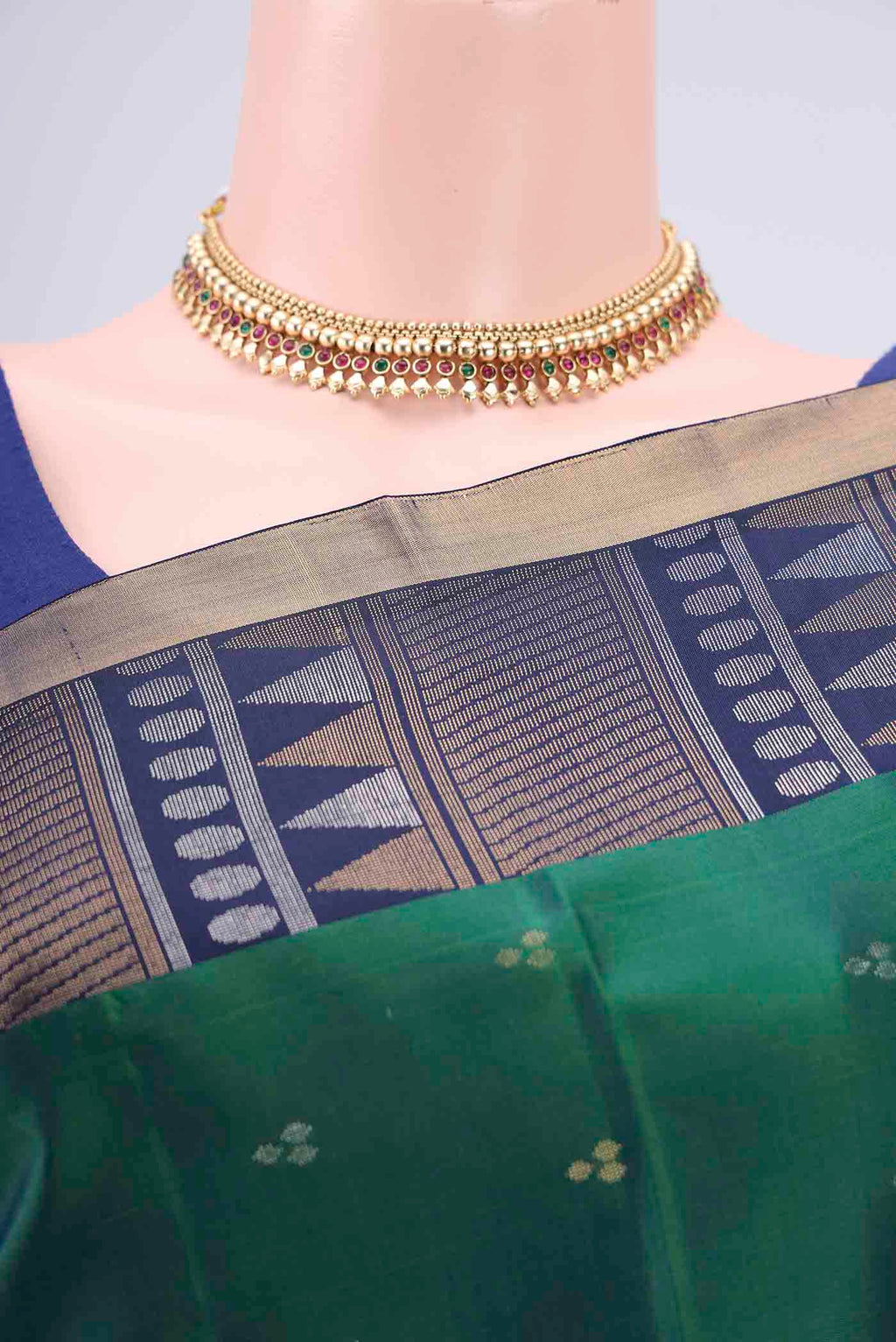 Border image of Bottle Green Soft Silk Saree with Zari Butta on the body and Zari Border. 