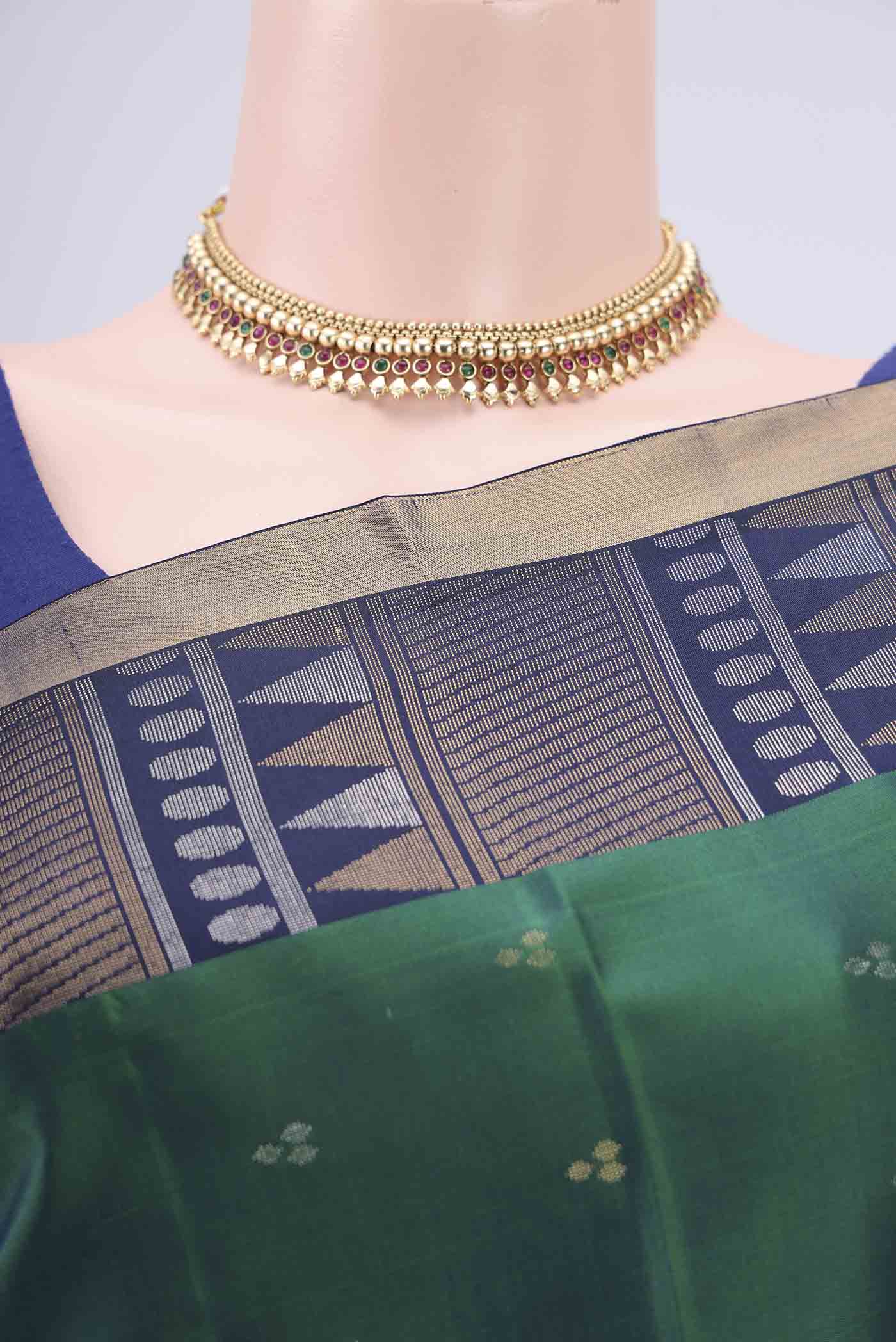 Border image of Bottle Green Soft Silk Saree with Zari Butta on the body and Zari Border. 