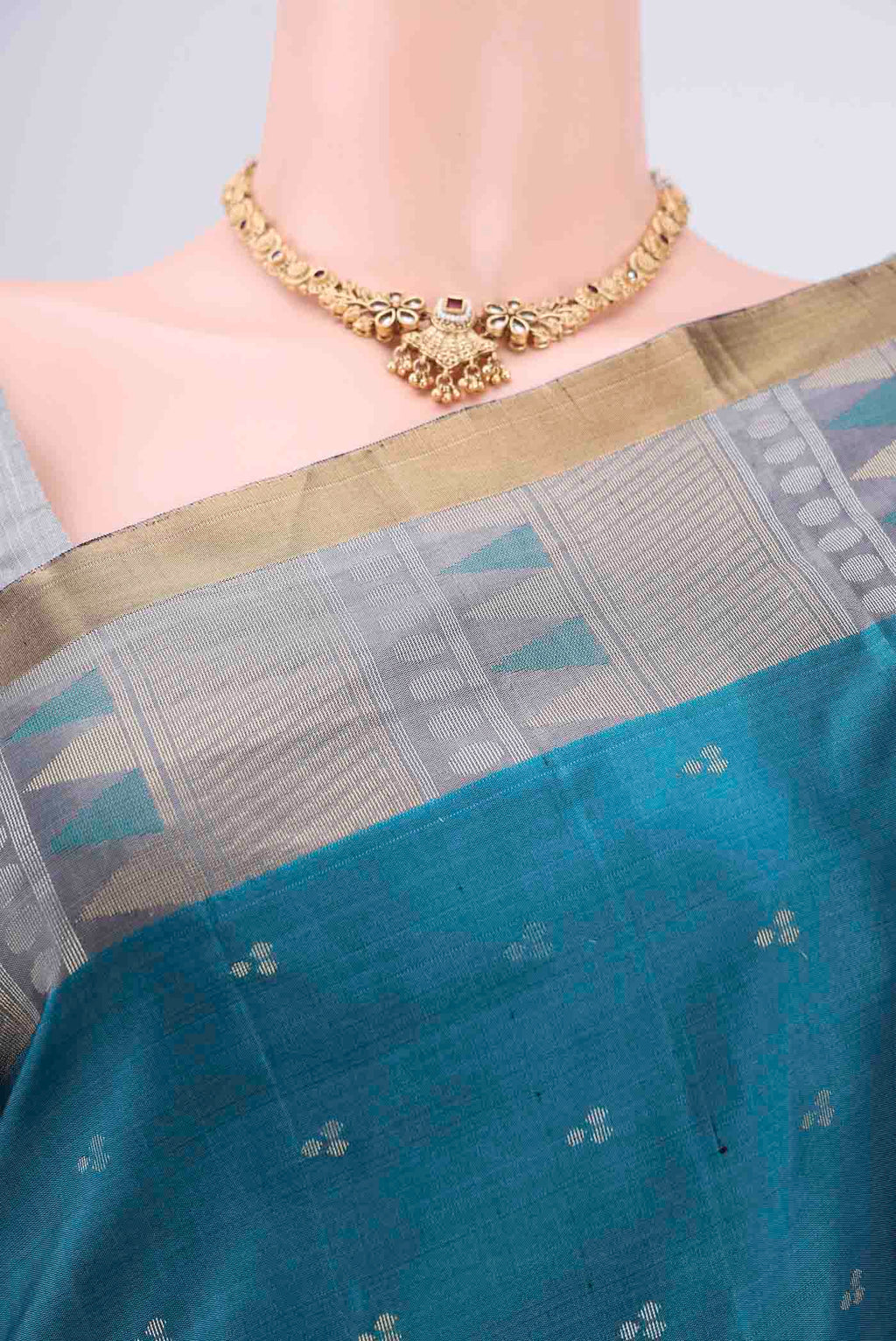 Border image of Peacock Blue Soft Silk Saree with Zari Butta on the body and Zari Border. 