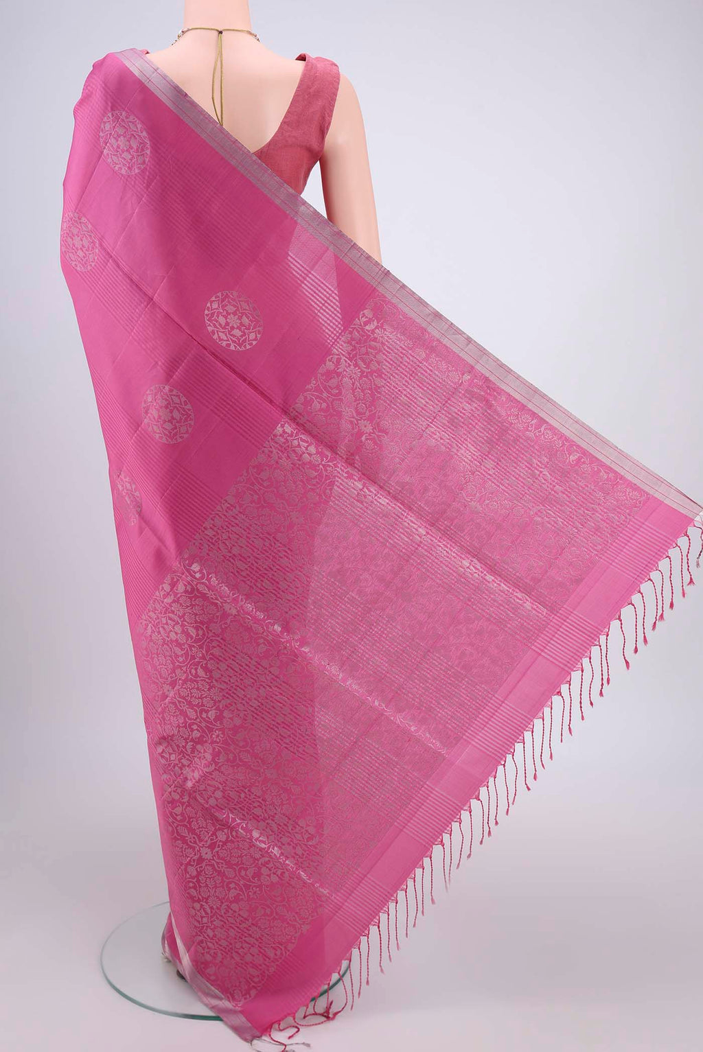 Flat view of Pink Soft Silk Saree with Stripes on the body and Zari Border. 