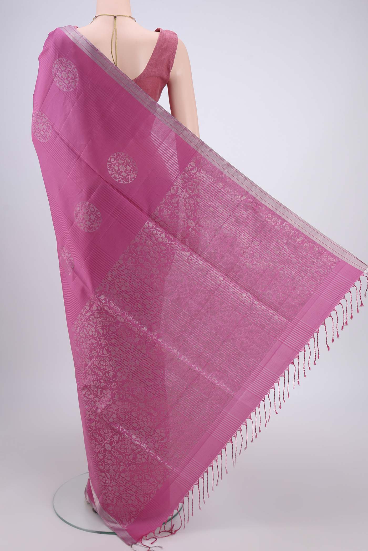 Flat view of Pink Soft Silk Saree with Stripes on the body and Zari Border. 